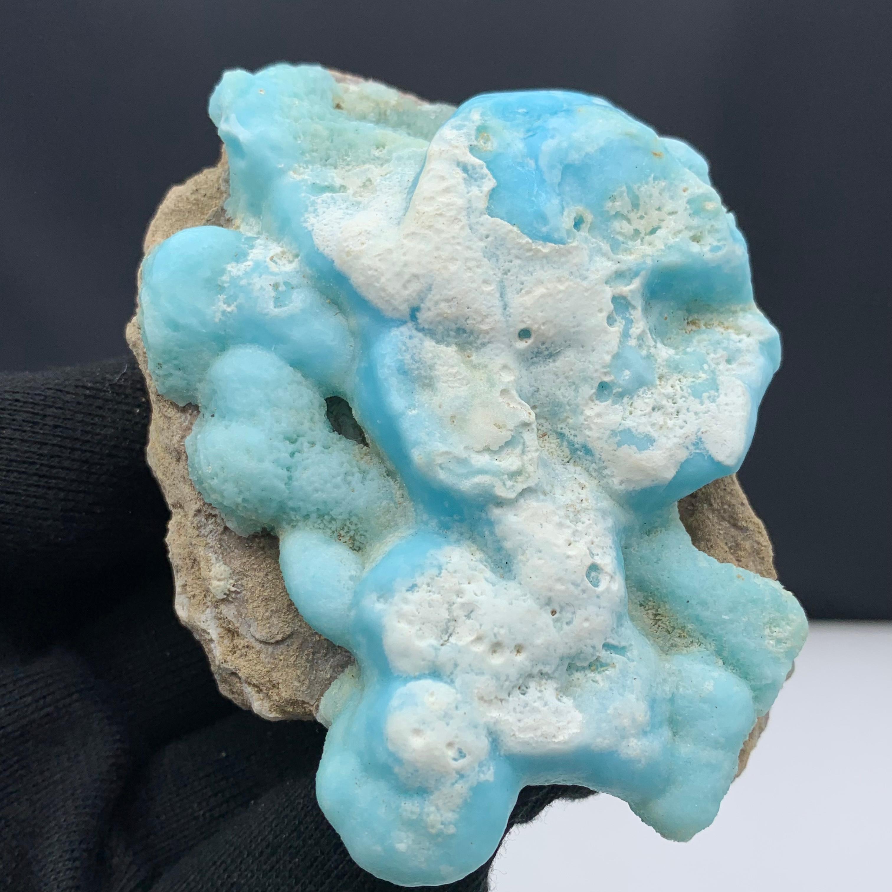 Adorable Botryoidal Aragonite Crystal On Matrix From Afghanistan 
Weight: 258 Gram 
Dimension: 9.5 x 7.3 x 4.3 Cm 
Origin : Hilmand, Afghanistan 

Blue Aragonite enhances emotional perception and increases empathy and compassion towards ourselves