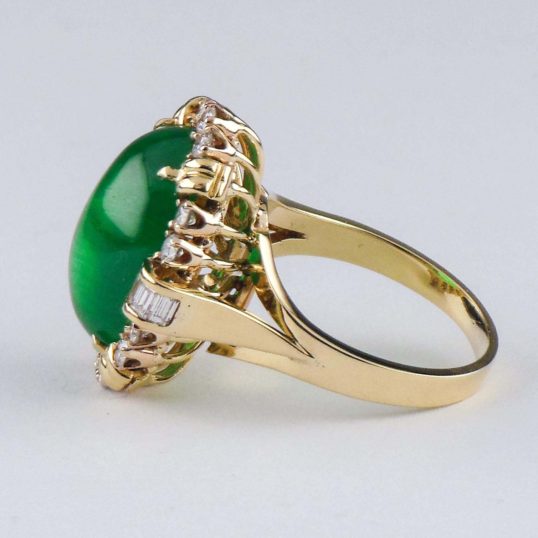 Gorgeous 18k Yellow Gold Solitaire Ring w/ Lively Colombian Emerald Cabochon
Total Emerald Weight: 25.82 ct
Features a Gorgeous Wire Gallery with a prong-set Diamond Bezel & Ornate Prongs
Features a mix of round and emerald-cut diamonds
Total