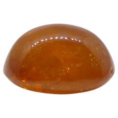 Garnet spessartine orange cabochon ovale de 25.87 carats du Nigeria