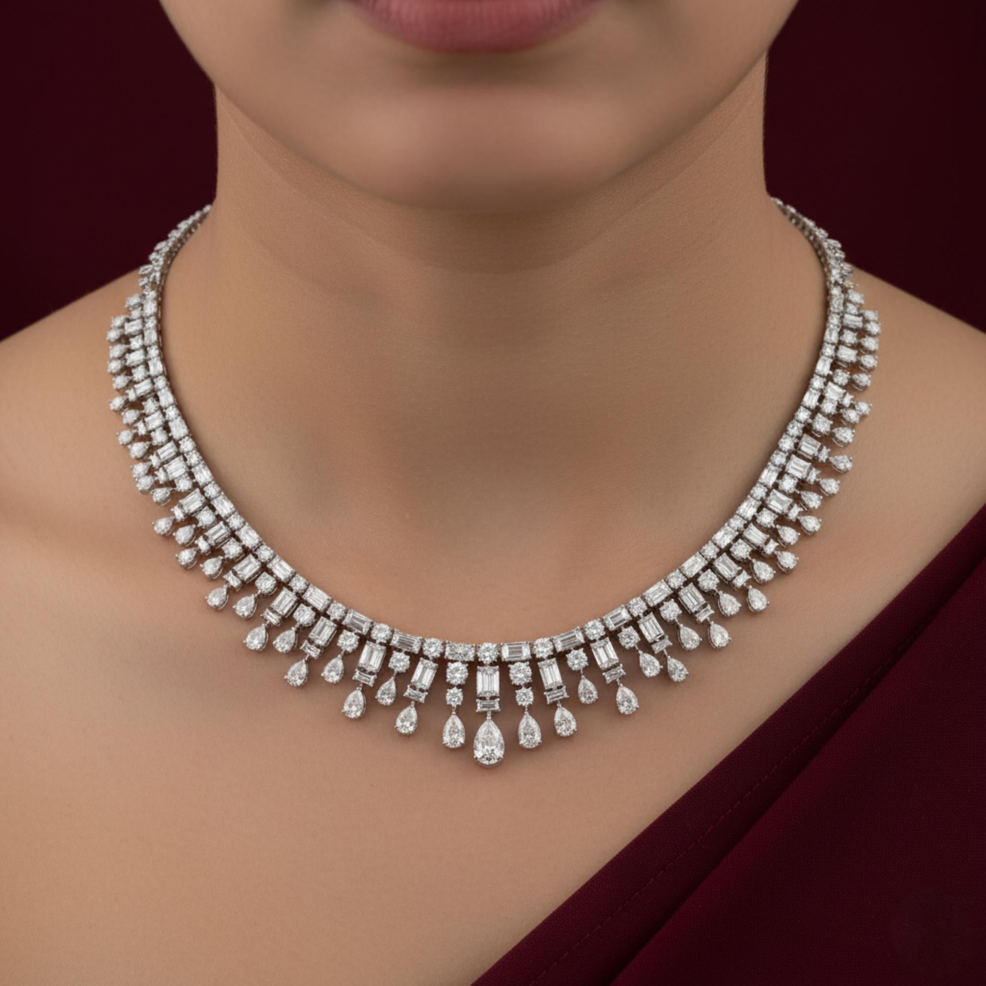 25,89 CTW Echte SI/H Diamant Choker Halskette 18k Weißgold Feiner Schmuck
Er zeichnet sich durch ein strukturiertes Layout mit einer abgestuften Reihe abwechselnd runder, baguette- und birnenförmiger Diamanten aus.
Diamanten sind ein universelles