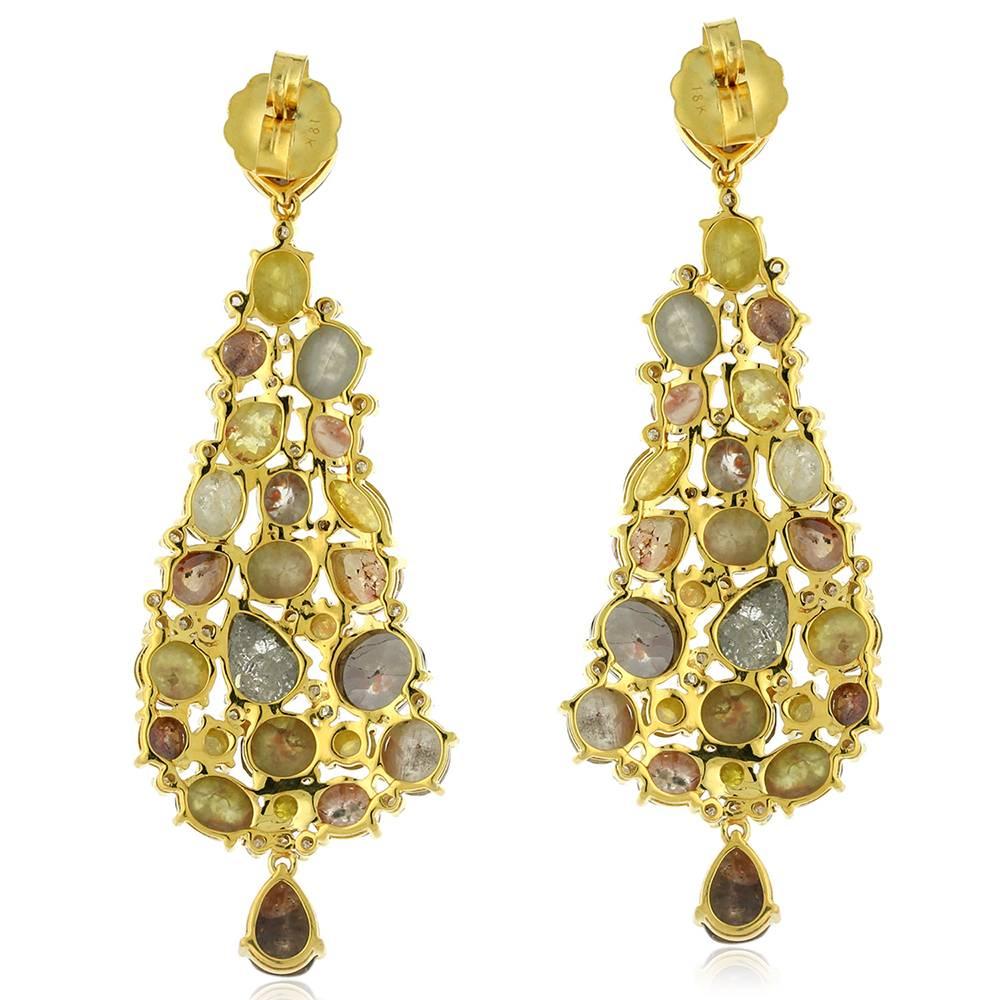 Gorgeous Stunning this colorful Ice Diamond dangle Earring will is one for a celebrity look anytime with with any outfit. 4

Earring Closure: Push Post 

18k: 21.91g
Diamond: 25.8ct