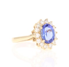 2.59 Carat Oval Cut Tanzanite Diamond 14 Karat Yellow Gold Ring