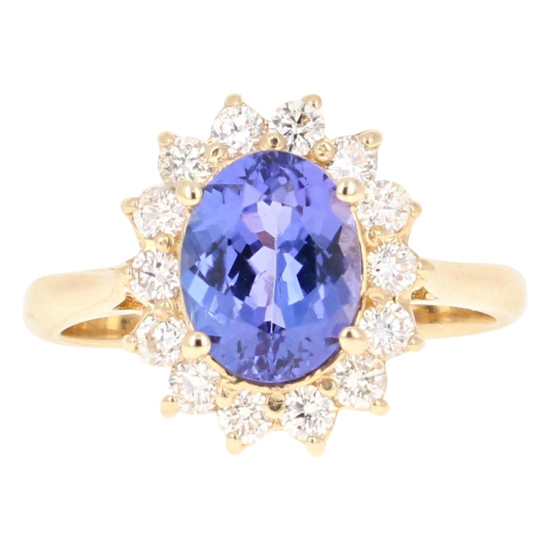 2.59 Carat Oval Cut Tanzanite Diamond 14 Karat Yellow Gold Ring For Sale