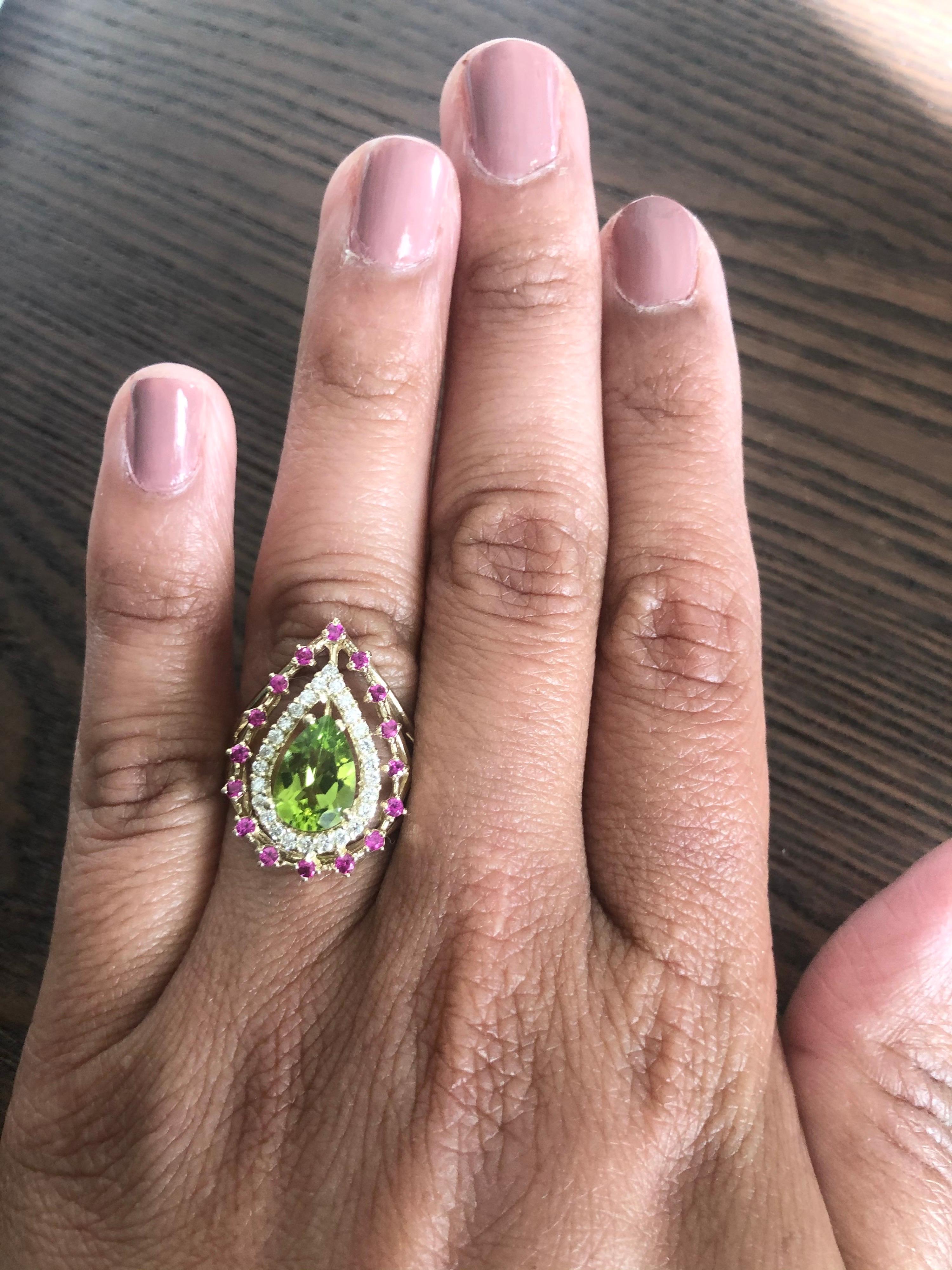 2.59 Carat Peridot Sapphire Diamond 14 Karat Yellow Gold Cocktail Ring In New Condition For Sale In Los Angeles, CA