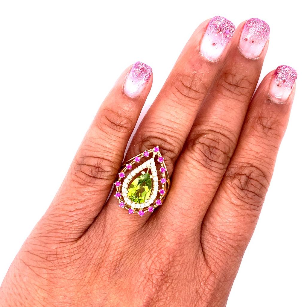 Pear Cut 2.59 Carat Peridot Sapphire Diamond Yellow Gold Cocktail Ring For Sale