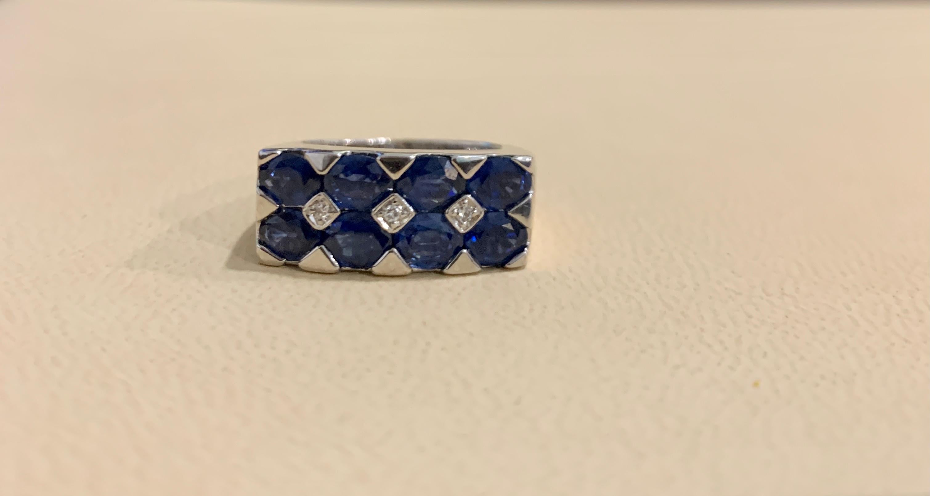 Oval Cut 2.5 Carat Blue Sapphire and Diamond Cocktail Ring in 18 Karat White Gold Estate For Sale