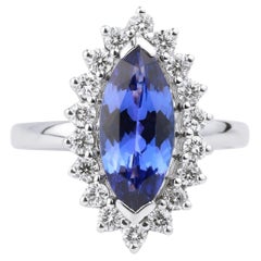 Anillo de compromiso de cóctel con halo de diamantes tanzanita AAA natural de 2,5 quilates y oro de 18k