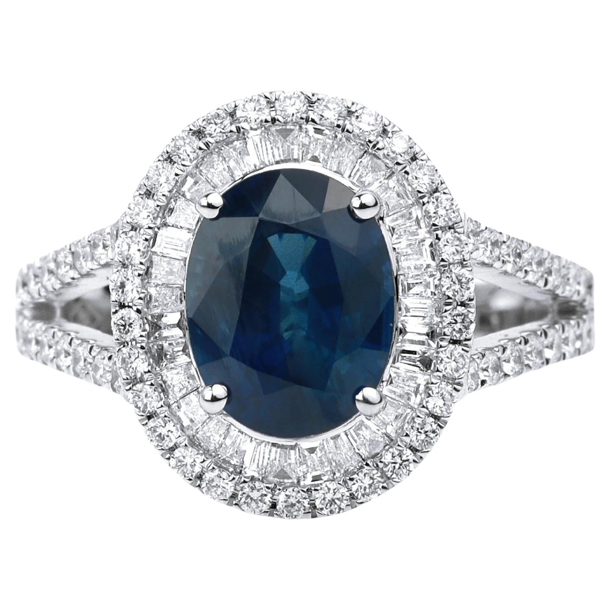 Bague de fiançailles cocktail en or blanc avec saphir bleu ovale et double halo de diamants