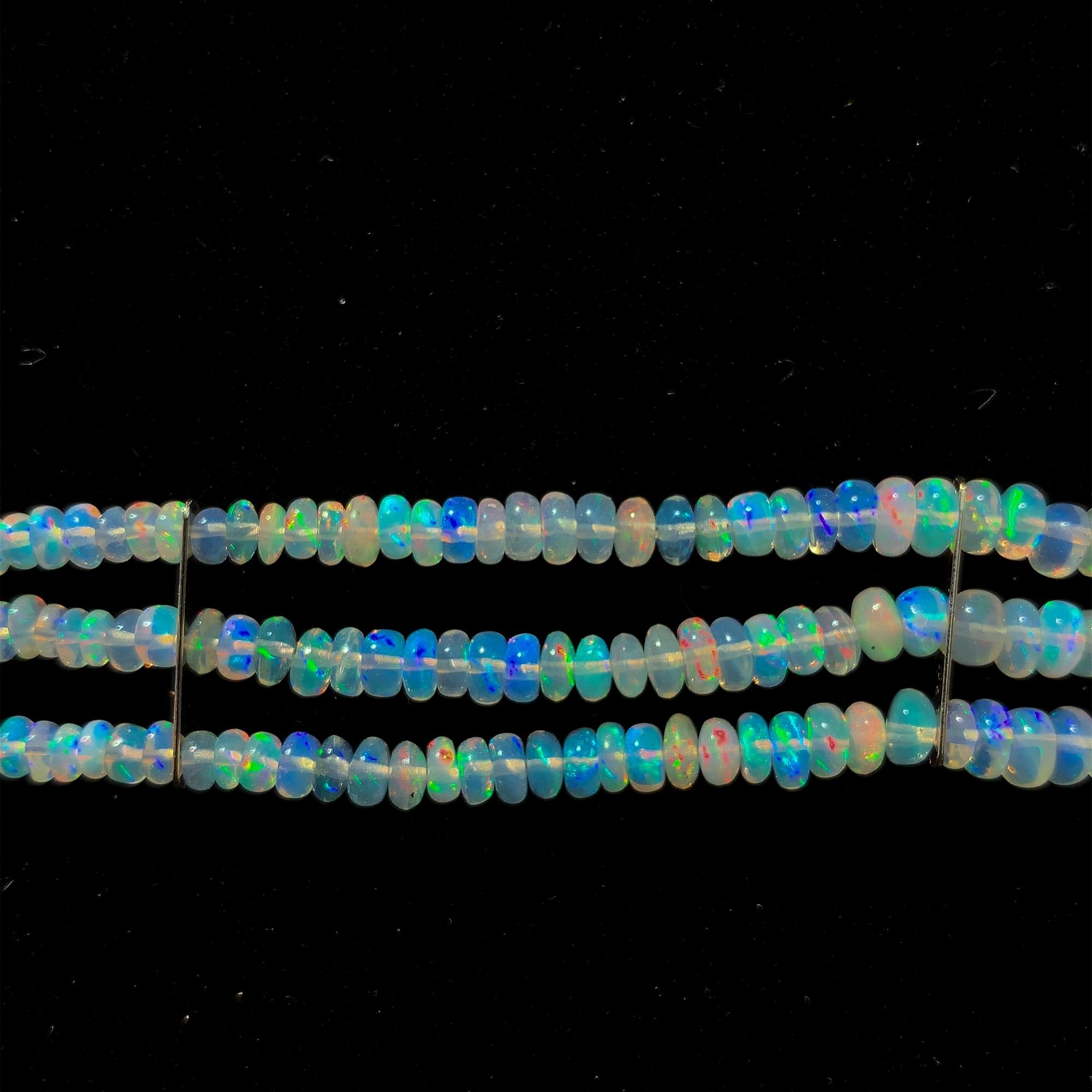 Modern 25cts Welo Opal 3 Strand Bead Bracelet For Sale