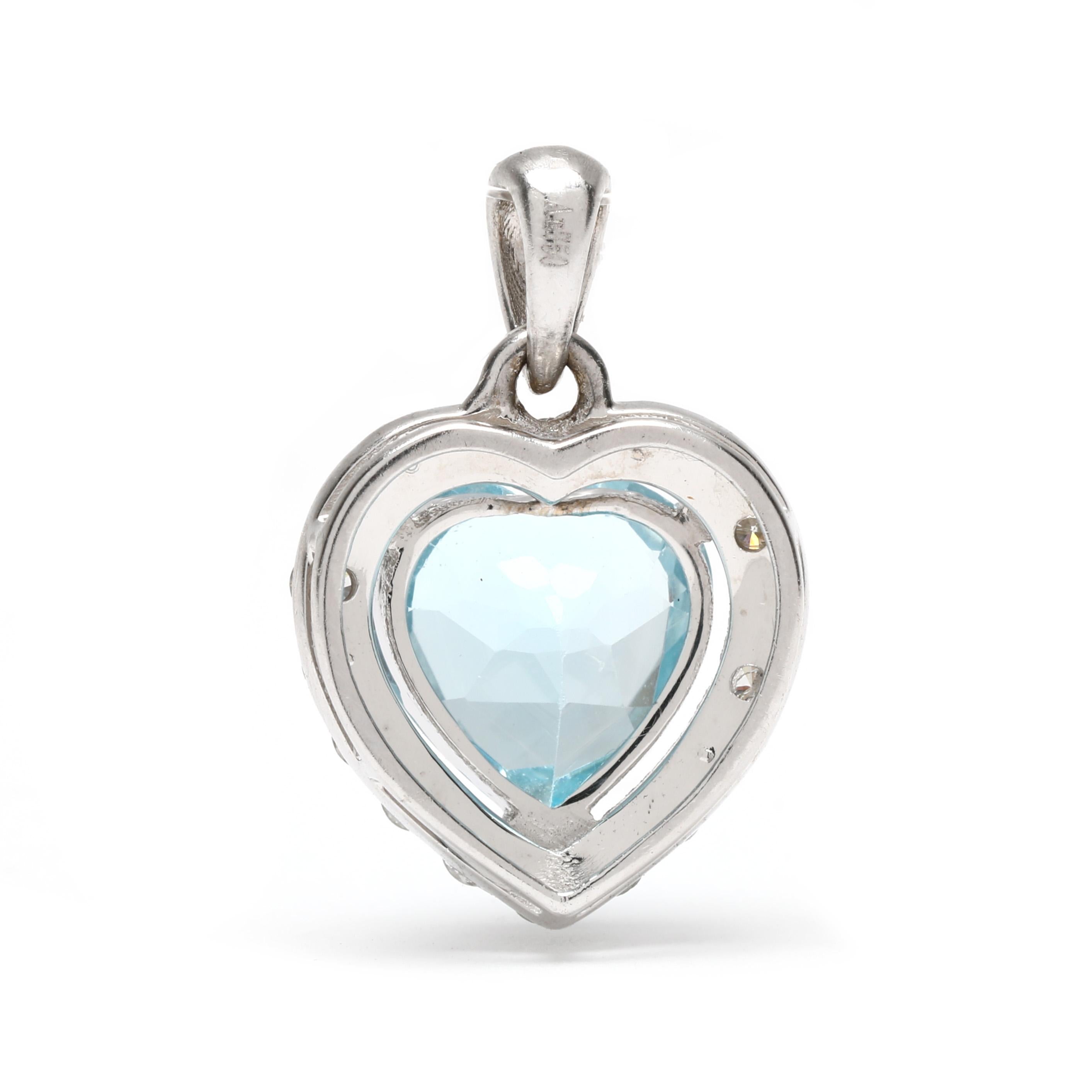 Stones:
blue topaz, 1 stone
heart cut
7.9 mm
approximately 2.3 carat
diamonds, 18 stones
round brilliant cut
1.6 mm
approximately .30 total carats
G-H color, SI2-I1 clarity

Length: .63 in.

Weight: 1.1 dwts. / 1.7 grams

Stamps: 