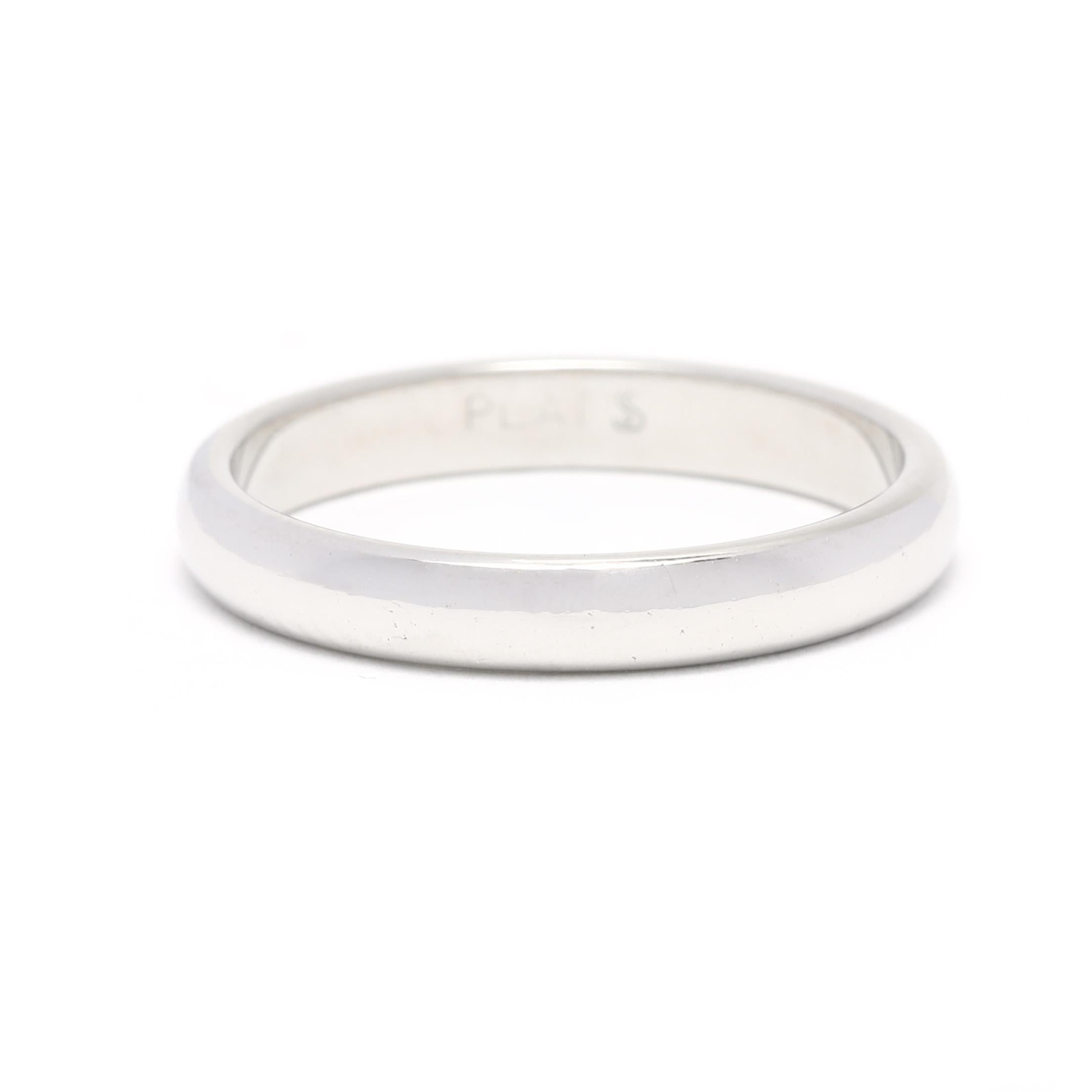 This 2.5mm plain wedding band is a perfect symbol of love and commitment. The band is crafted from Platinum, ensuring its durability and preciousness. The ring is a size 4 and features a simple yet elegant design, perfect for those who are looking