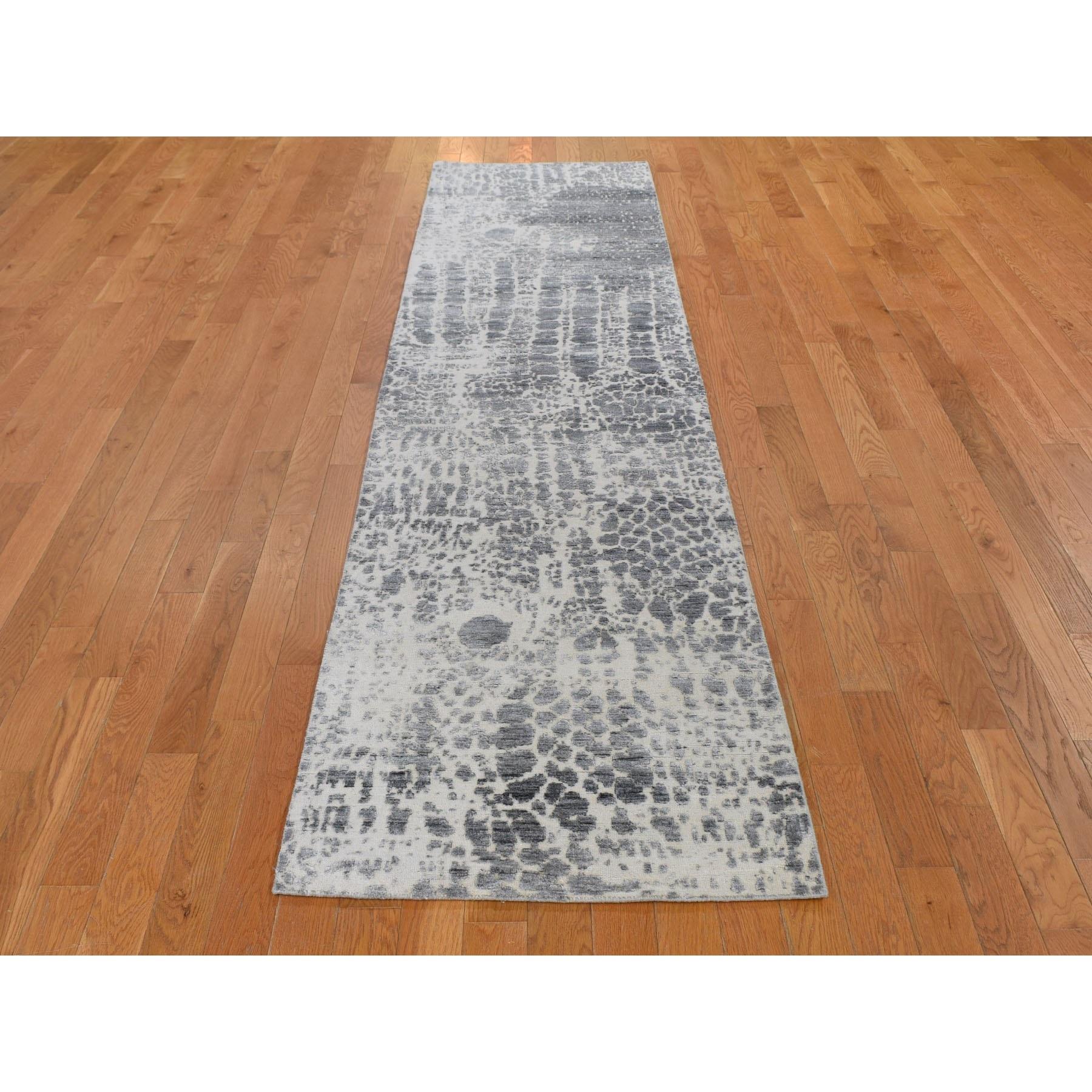 This is a truly genuine one-of-a-kind Abstract Design Wool And Silk Hi-Low Pile Denser Weave Runner Rug. It has been Knotted for months and months in the centuries-old Persian weaving craftsmanship techniques by expert artisans.
Primary materials: