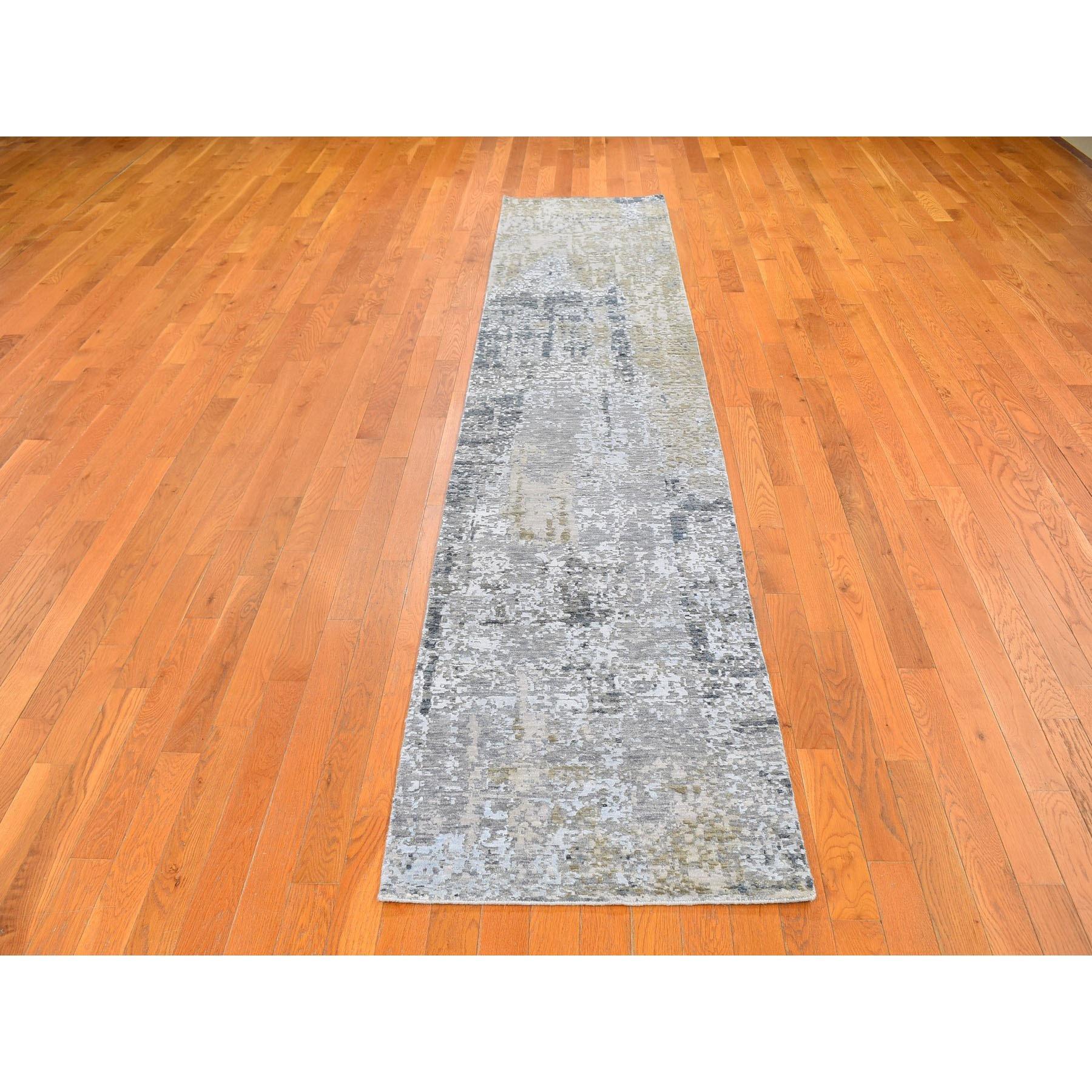 This is a truly genuine one-of-a-kind Gray Abstract Design Wool and Silk Hi-Low Pile Denser Weave Hand Knotted Oriental Rug. It has been woven for months and months in the centuries-old Persian weaving craftsmanship techniques by expert