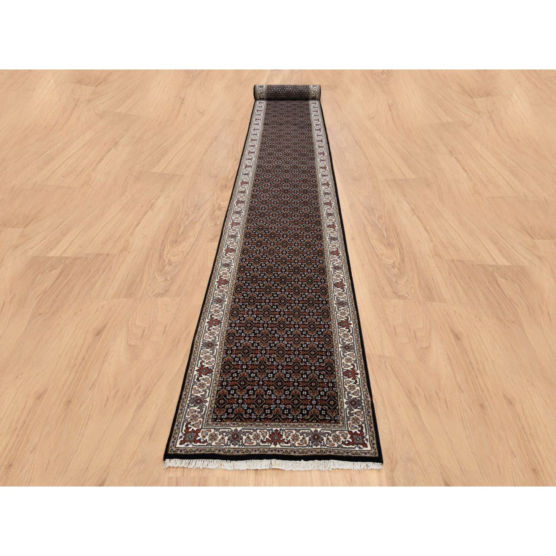 This is a truly genuine one-of-a-kind Rich Black Hand Knotted 175 KPSI Wool and Silk Herati with All Over Design XL Runner Oriental Rug. It has been Knotted for months and months in the centuries-old weaving craftsmanship techniques by expert