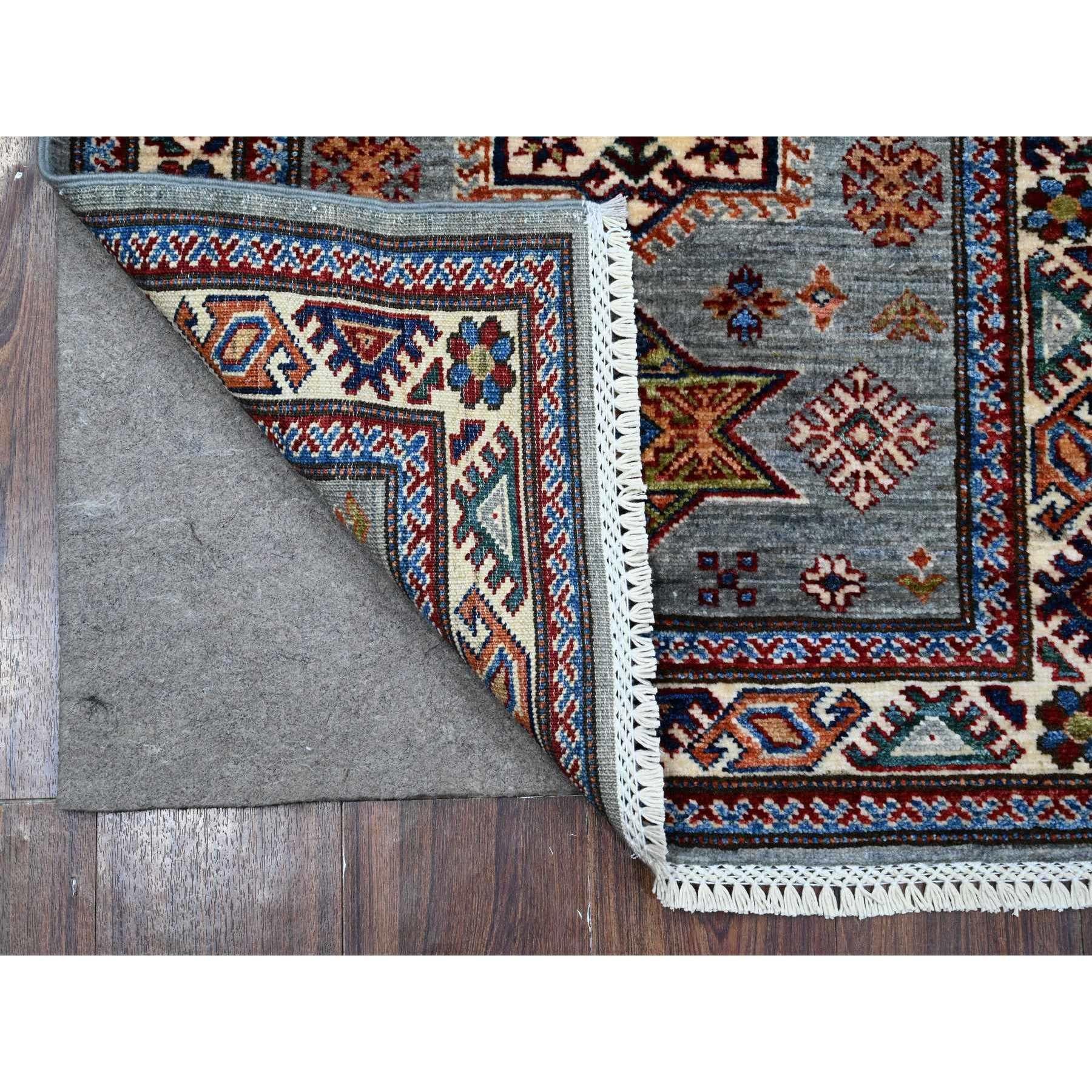 This is a truly genuine one-of-a-kind Afghan Super Kazak, Hand Knotted, Pure Wool, Oriental Rug. It has been Knotted for months and months in the centuries-old weaving craftsmanship techniques by expert artisans.
Primary materials: Wool
Latex: No