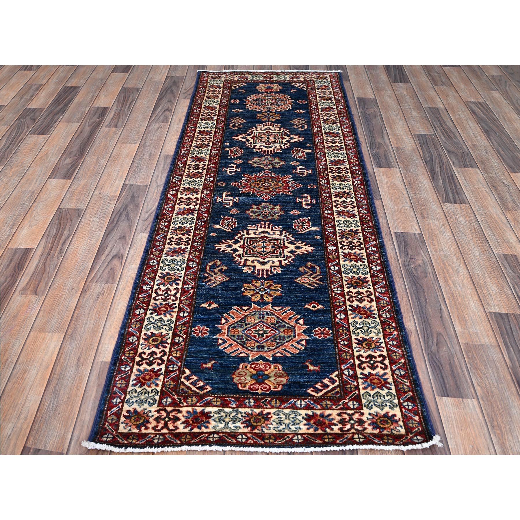 This is a truly genuine one-of-a-kind Afghan Super Kazak, Hand Knotted, Pure Wool, and Oriental Rug. It has been Knotted for months and months in the centuries-old weaving craftsmanship techniques by expert artisans.
Primary materials: Wool
Latex: