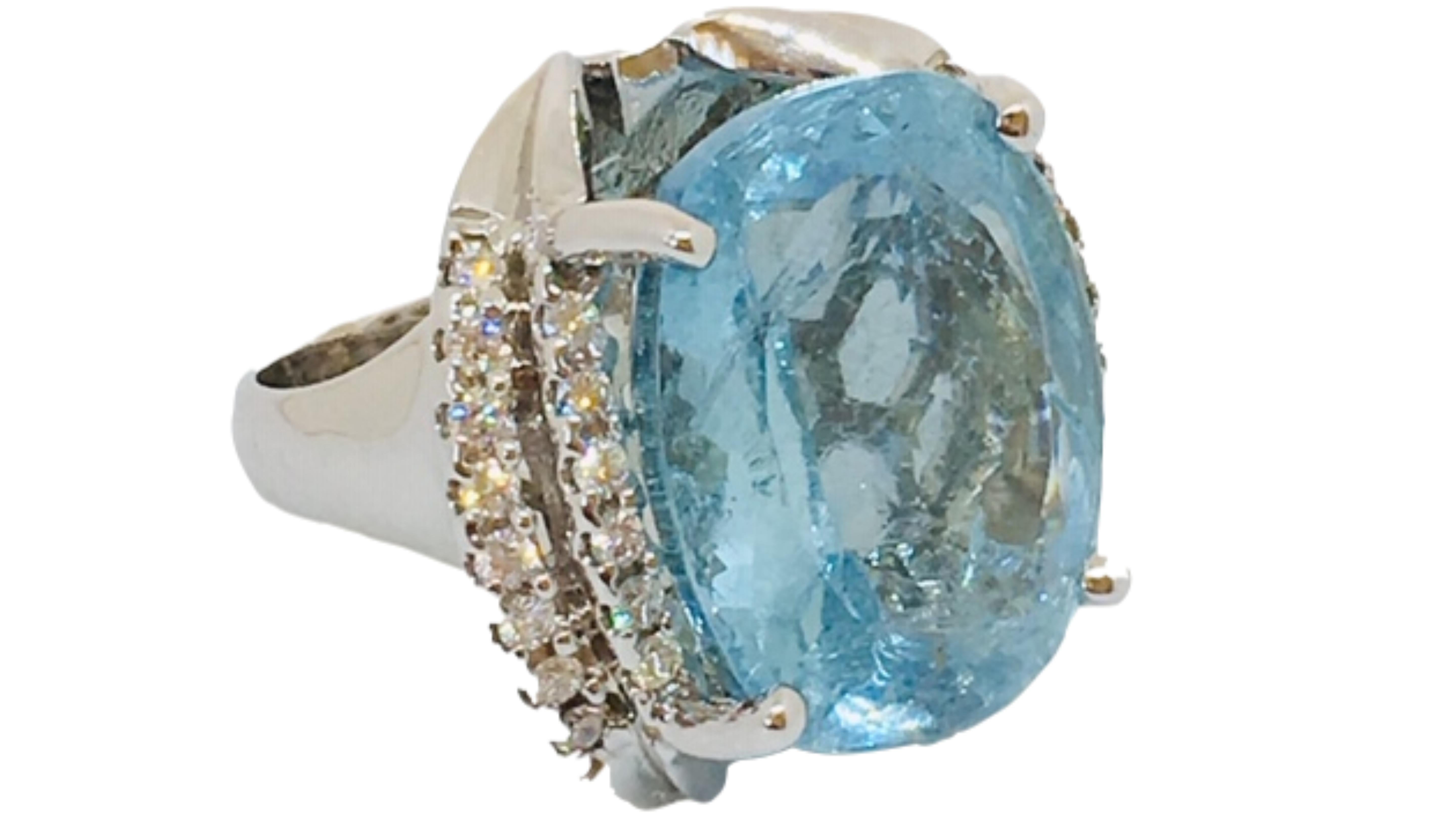 
Aquamarine ring 26ct  Oval Cut with 34 White diamonds at 1.19ct set in White Gold 14k.  


Aquamarine with diamonds at each side and sparkling like a crystal clear ocean, it was believed to be the treasure of mermaids. Used by sailors as a talisman