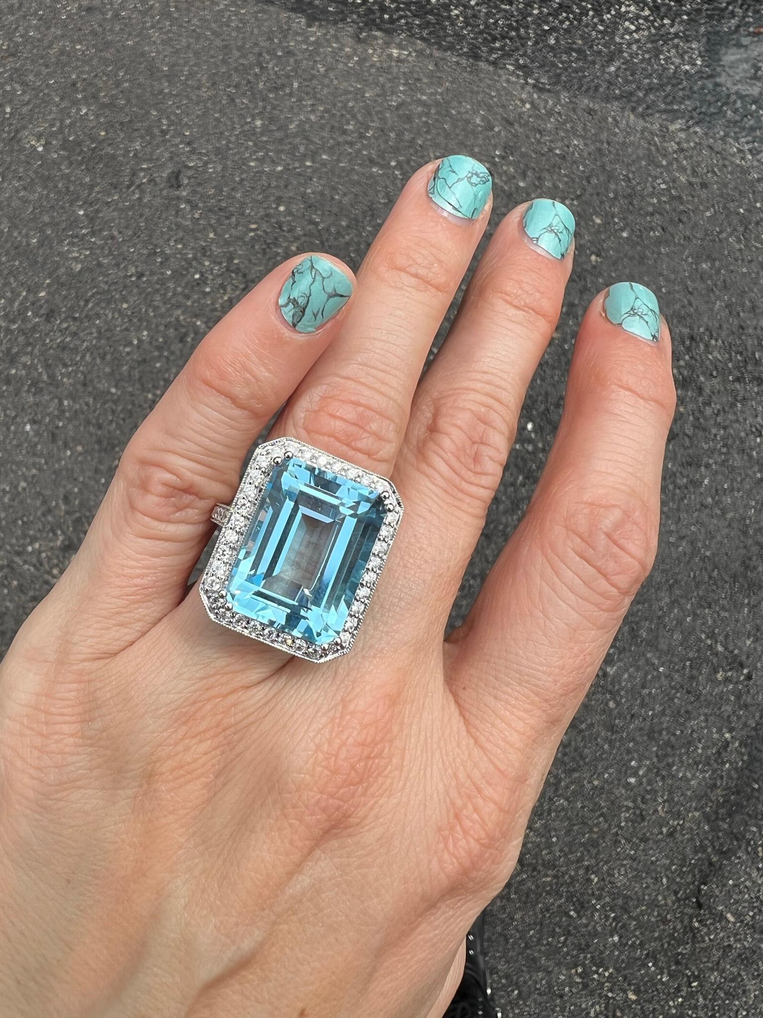 Emerald Cut 26 Carat Blue Topaz and Diamond Ring For Sale