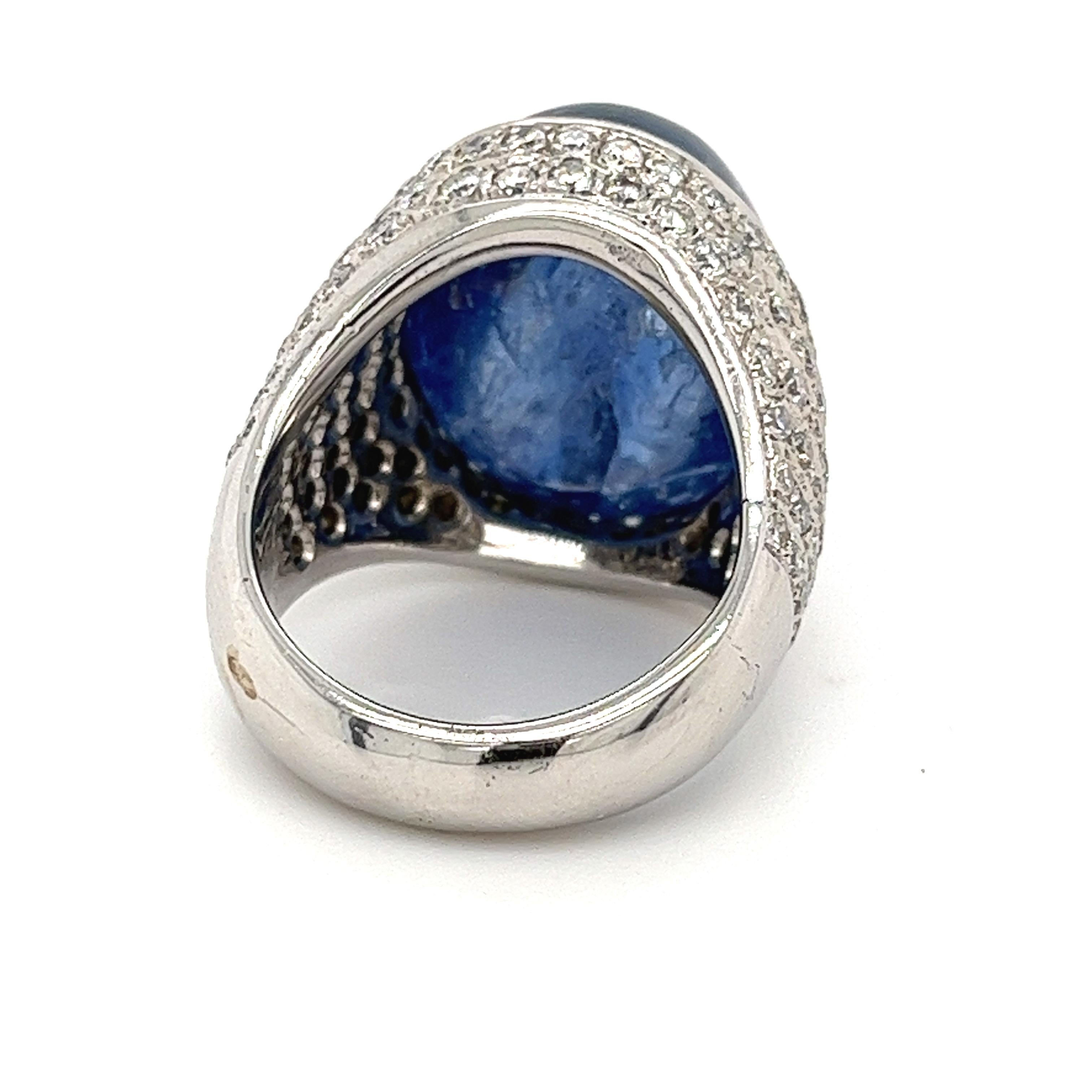 Shop this absolute masterpiece Blue Sapphire and Diamond ring. GIA certified. This Sapphire bears excellent luster and brilliance, with no indications of clarity or color enhancements. At a massive weight of 26 carats, with such a lively color and