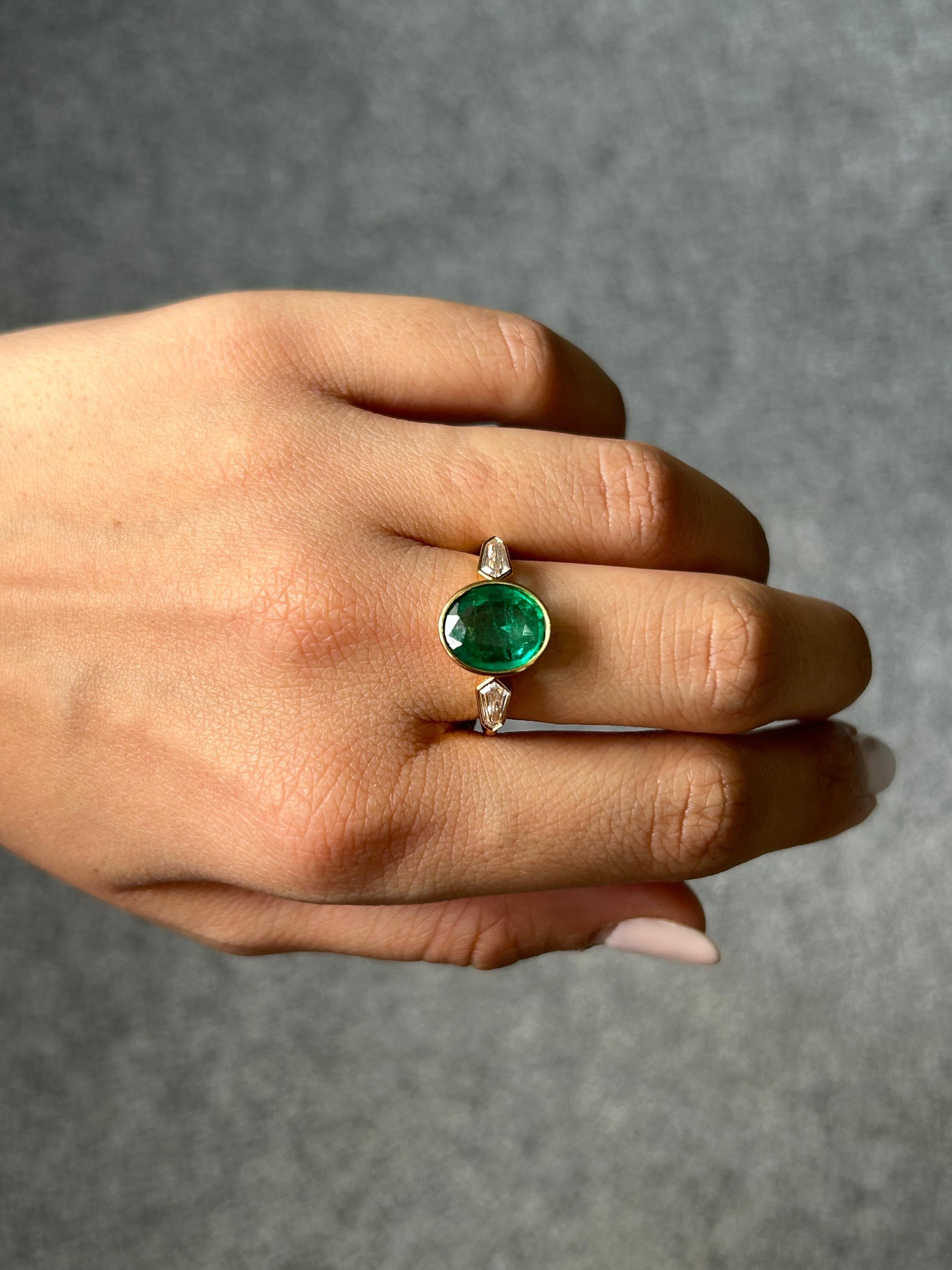 2.6 Carat Oval Shape Emerald and Diamond Three Stone Engagement Ring For Sale 4