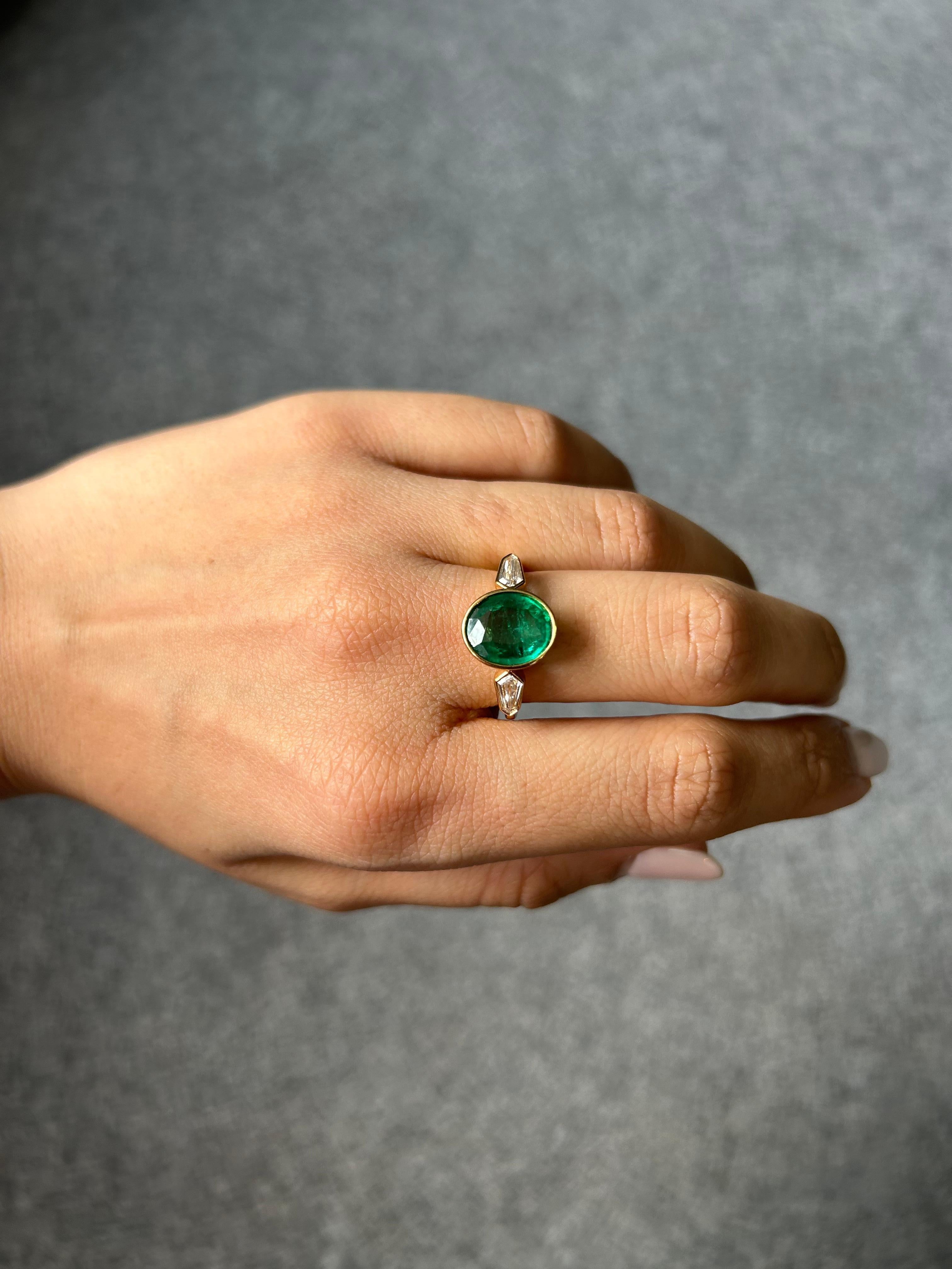 2.6 Carat Oval Shape Emerald and Diamond Three Stone Engagement Ring For Sale 5