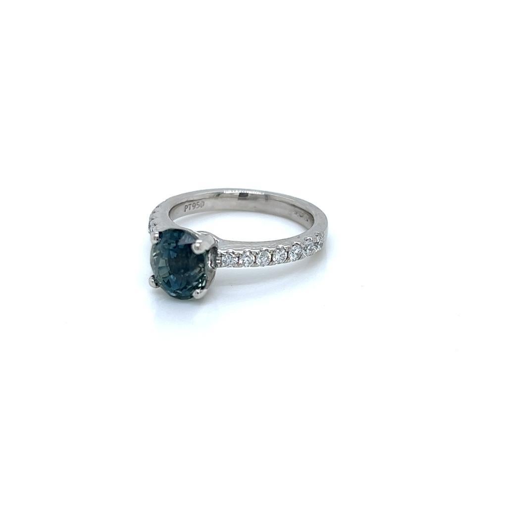 Contemporary 2.6 Carat Oval Teal Sapphire and Diamond Ring in Platinum For Sale