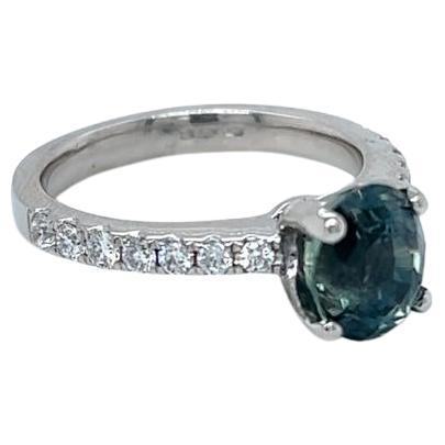 2.6 Carat Oval Teal Sapphire and Diamond Ring in Platinum For Sale