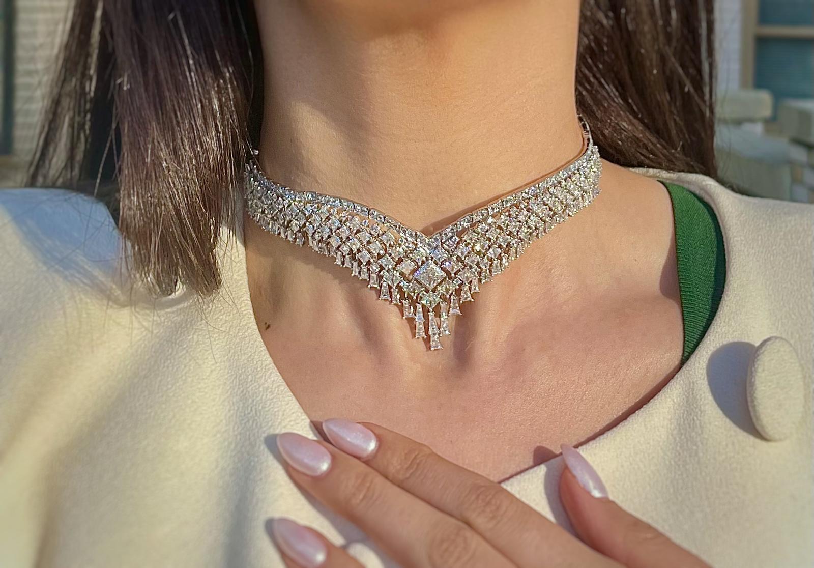 An enchanting diamond choker necklace is ideal for the red carpet, a gala or a royal wedding. The luxurious combination of trapezoid, Princess-cut and rounds is breathtaking and show stopping.  features 583 white diamonds weighing a total of
