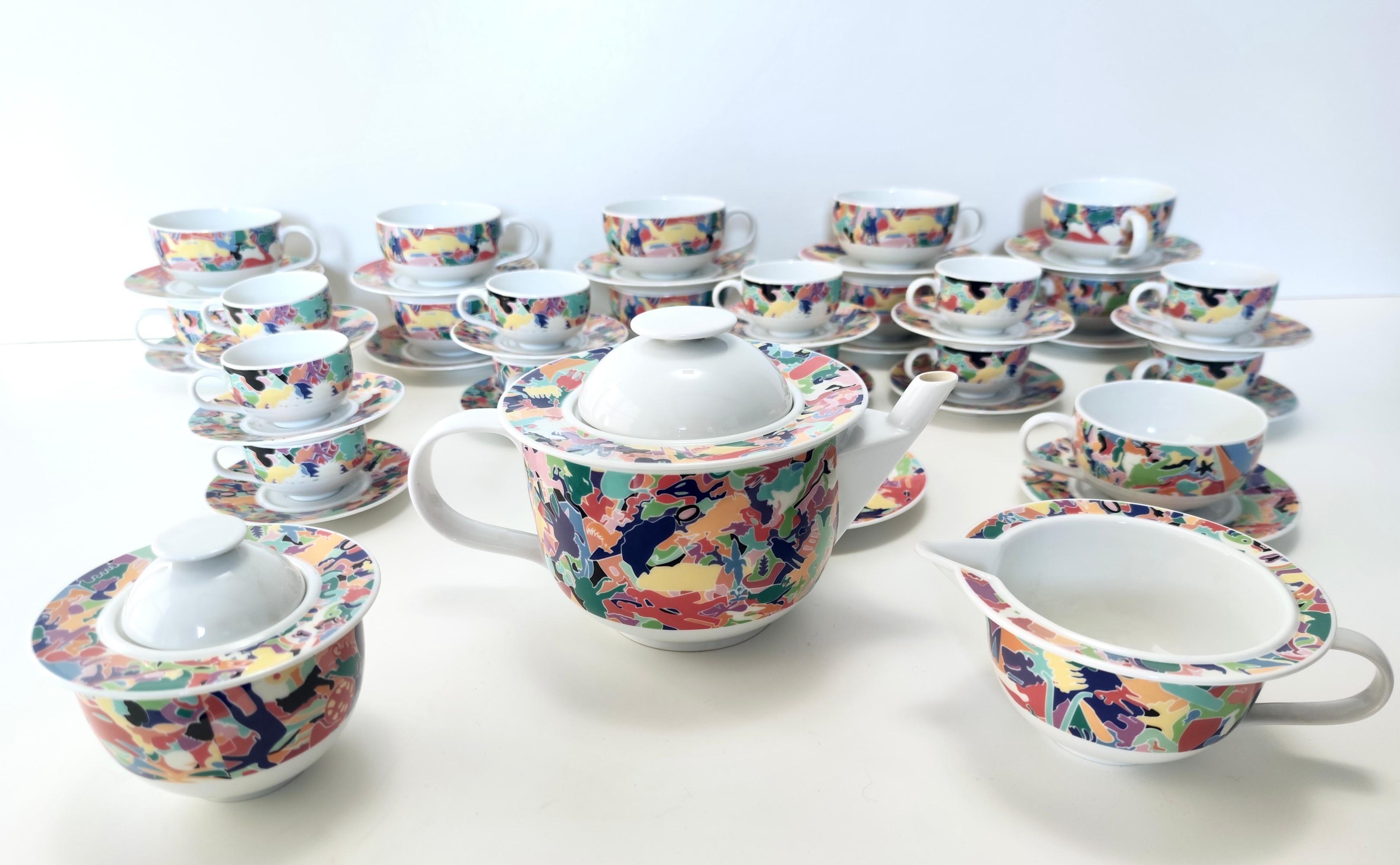 Made in Italy, 1993.
This set was designed by Ettore Sottsass for Alessi. The colorful pattern is also designed by Alighiero Boetti. 
In this set there are 
- 12 coffee cups with 12 plates;
- 11 tea cups with 12 plates (un cup is missing);
-