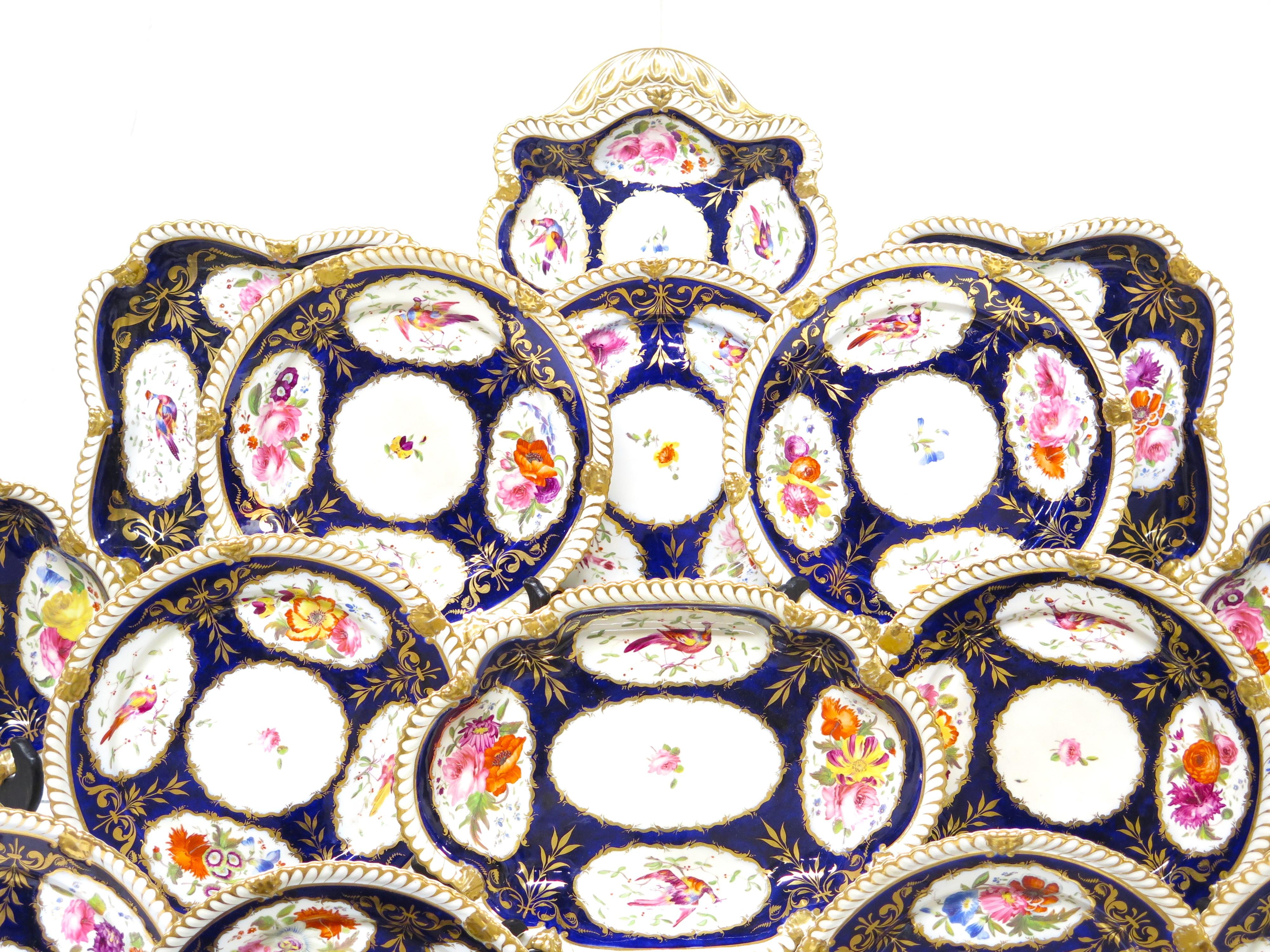 a 26 piece group of Royal Crown Derby-style cobalt, gilt and floral foliate shaped assorted dinner ware / China,  not marked. England, circa 1835

MEASUREMENTS:

17 Plates 8.5