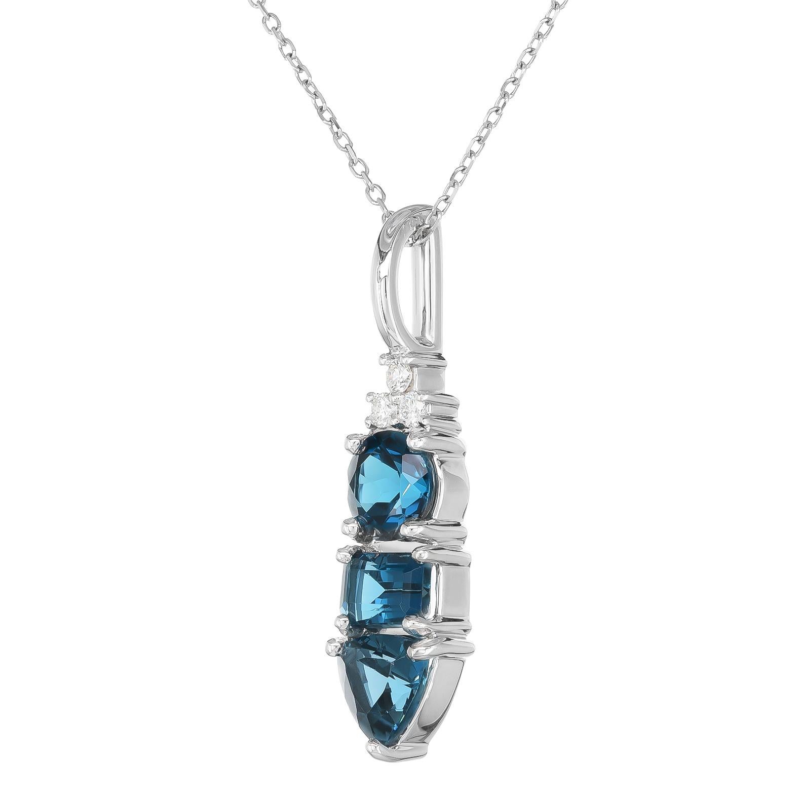 Dive into the captivating depth of London Blue Topaz, elegantly set in a 14K white gold pendant, complemented by the sparkle of diamonds. This exquisite piece offers a unique blend of sophistication and allure, ideal for those who appreciate the