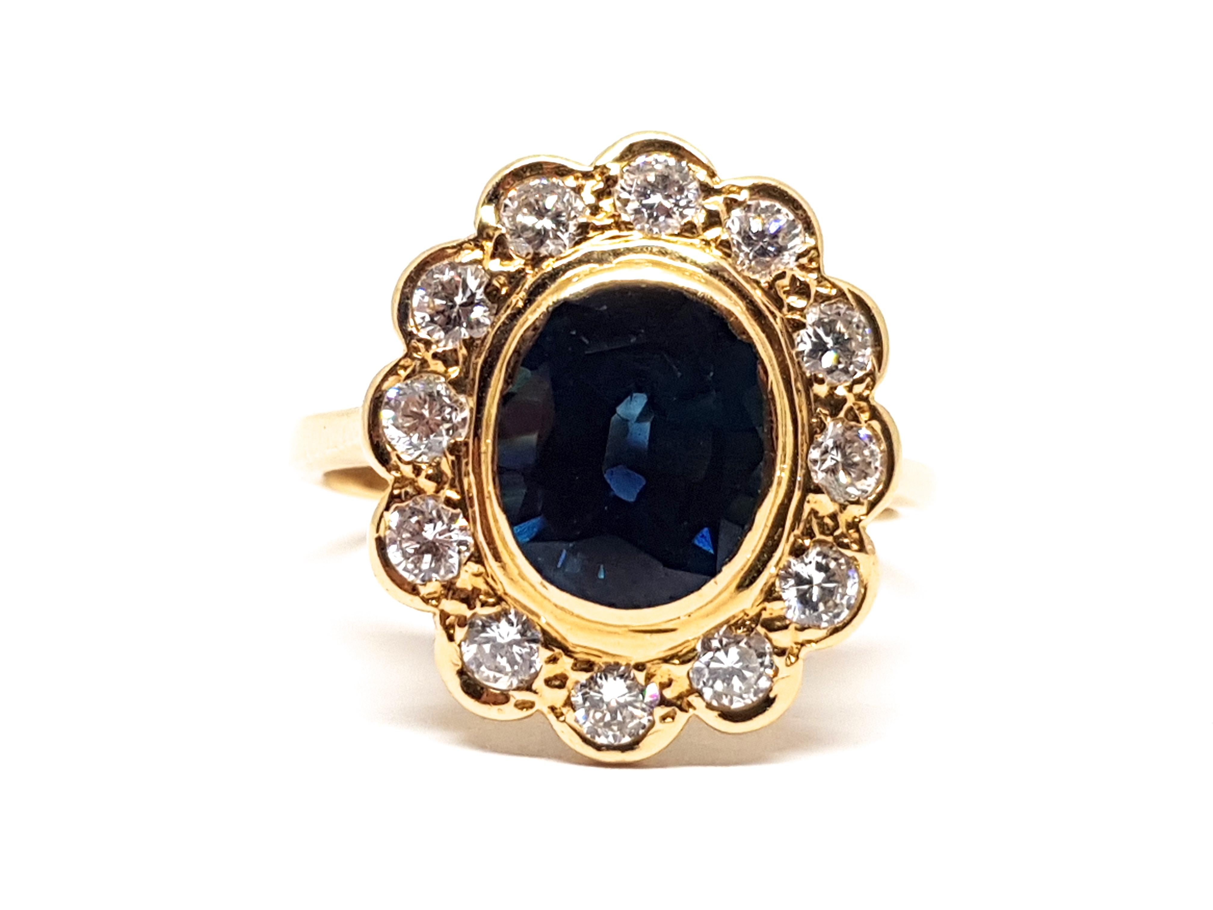 GGold: 18 Karat Yellow Gold 
Weight: 4.62gr. 
Diamonds: 0.60 ct. Colour: F clarity: VS1 
Sapphire: 2.00ct. 
Width: 1.60 cm. 
Ring size: 53 / 17.00mm 
Free resizing of Ring up to size 70 / 22mm / US 13 
All our jewellery comes with a certificate and