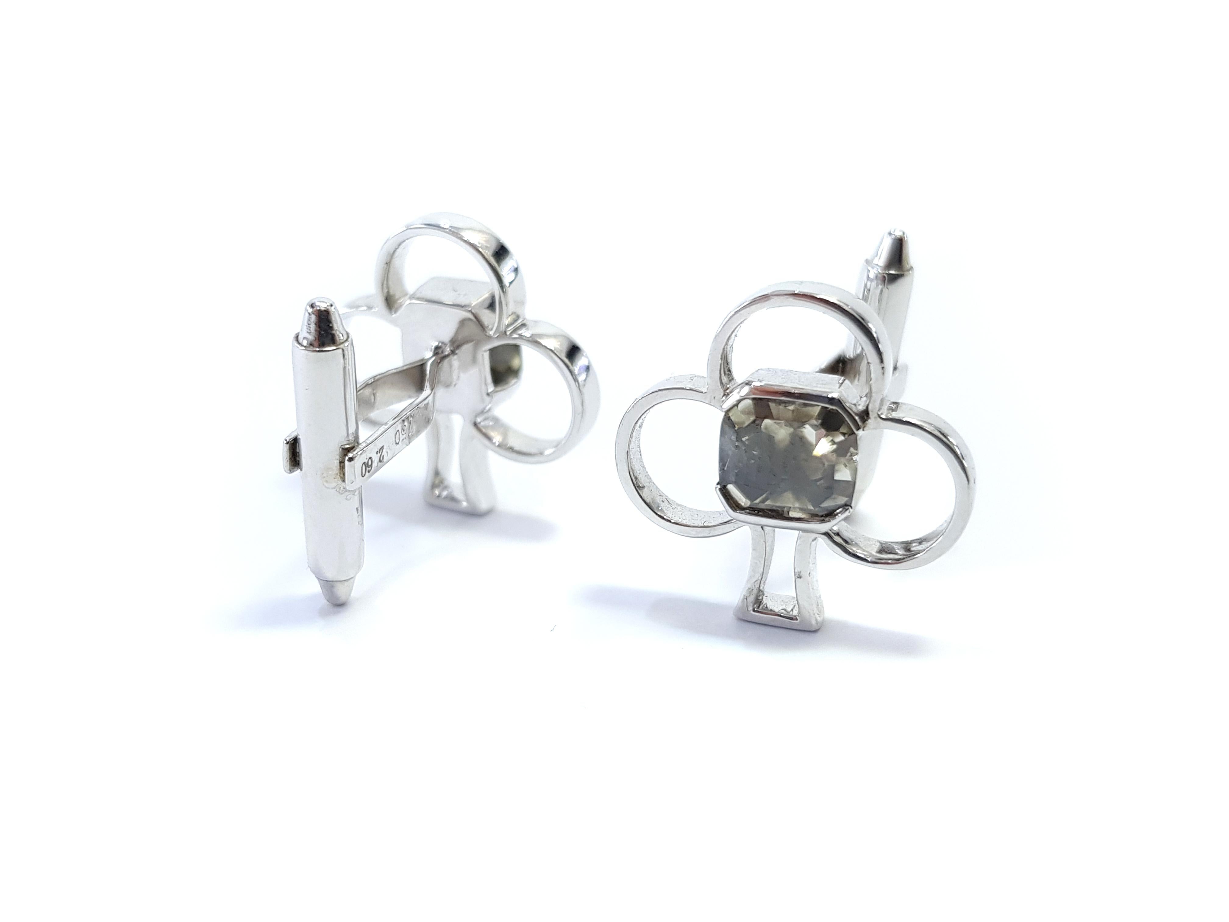 Bespoke 2.60 Carat Asscher Cut/ Modified Square Club Shape Cuff links featuring an unusual and unique Greenish Grey Color and a Clarity of SI1 Diamond Set in 18 Karat White Gold. These striking cufflinks will add style and elegance to any wardrobe,