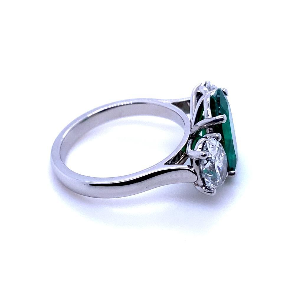 Modern 2.60 Carat Columbian Emerald and Diamond Three Stone Platinum Engagement Ring For Sale
