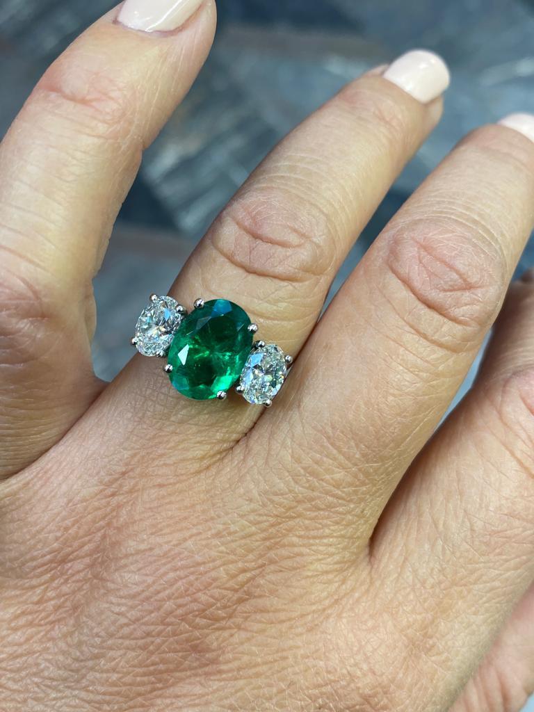 Emerald Cut 2.60 Carat Columbian Emerald and Diamond Three Stone Platinum Engagement Ring For Sale