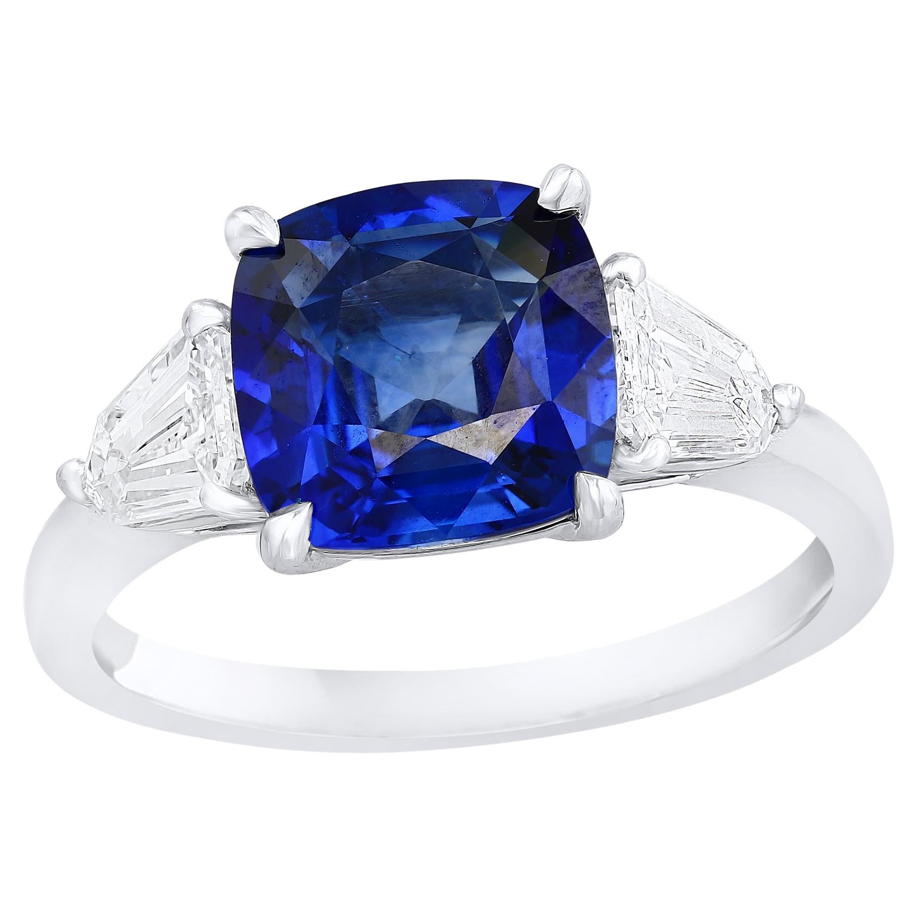 2.60 Carat Cushion Cut Blue Sapphire Diamond Three-Stone Ring in Platinum For Sale