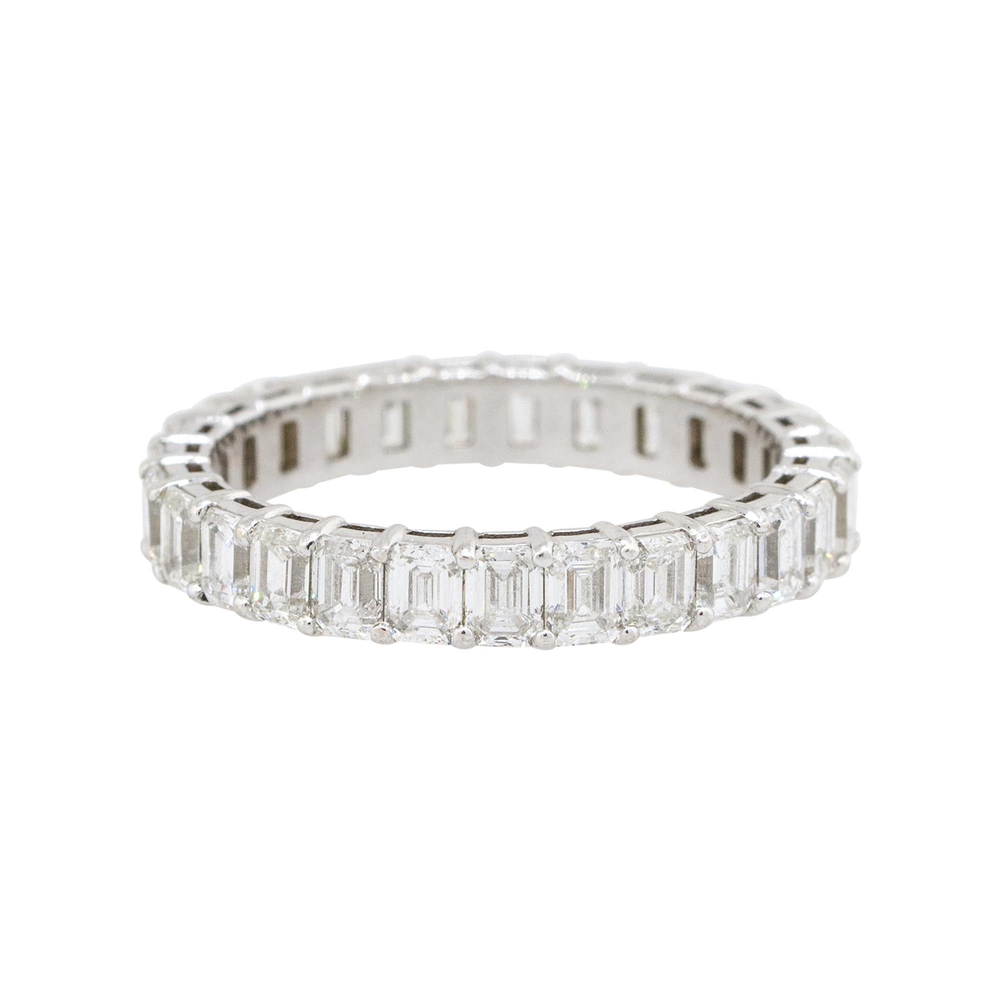 Material: 14k white gold
Diamond Details: Approx. 2.60ctw of emerald cut Diamonds. Diamonds are G/H in color and VS in clarity
Total Weight: 1.8g (1.2dwt)
Size: 6.25 
Dimensions: 21mm x 3.40mm x 21mm
Additional Details: This item comes with a