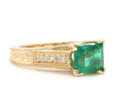 2.60 Carat Natural Emerald and Diamond 14 Karat Solid Yellow Gold Ring