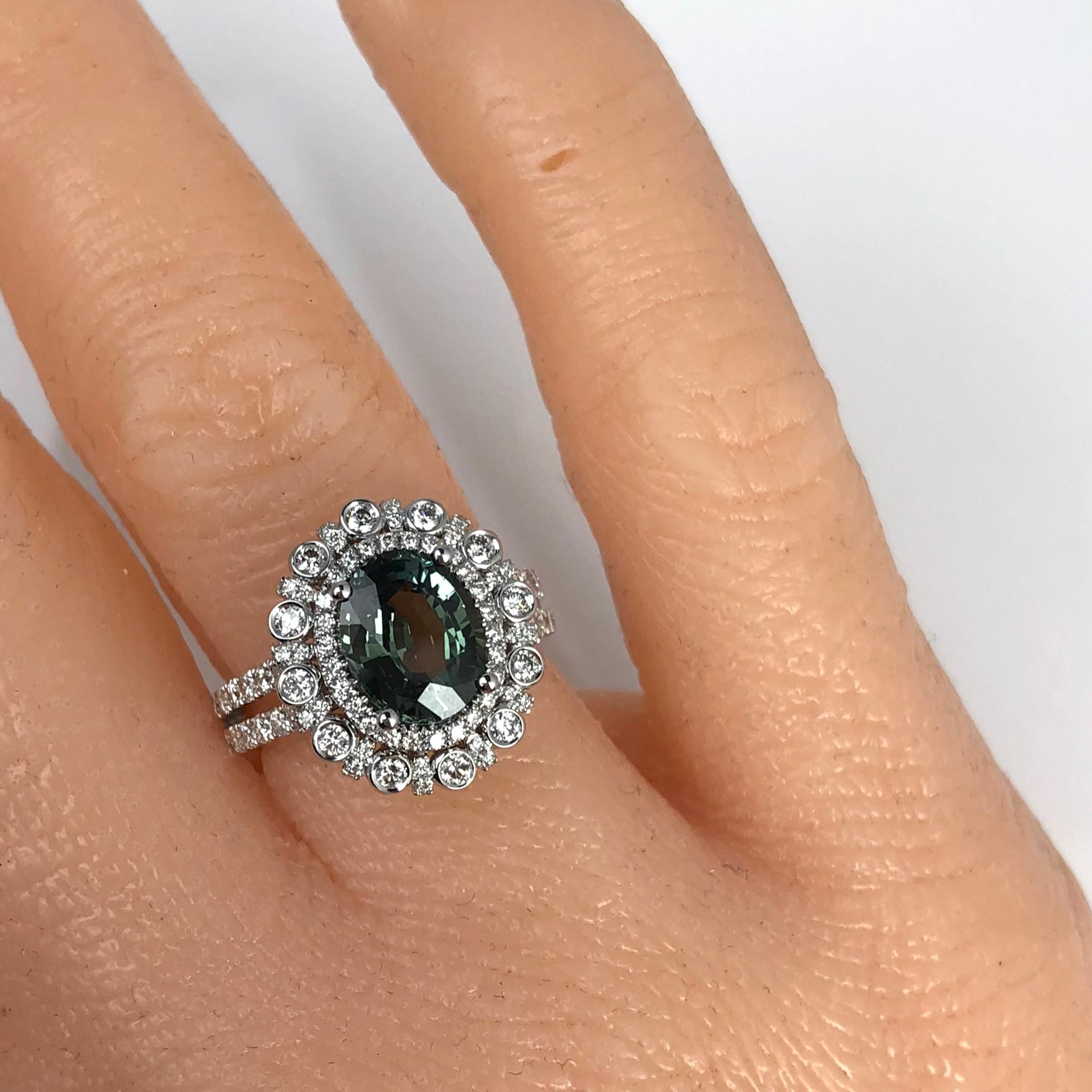 Contemporary 2.60 Carat Oval Cut Green Sapphire and 1.03 Carat Diamond Ring in 18 Karat Gold