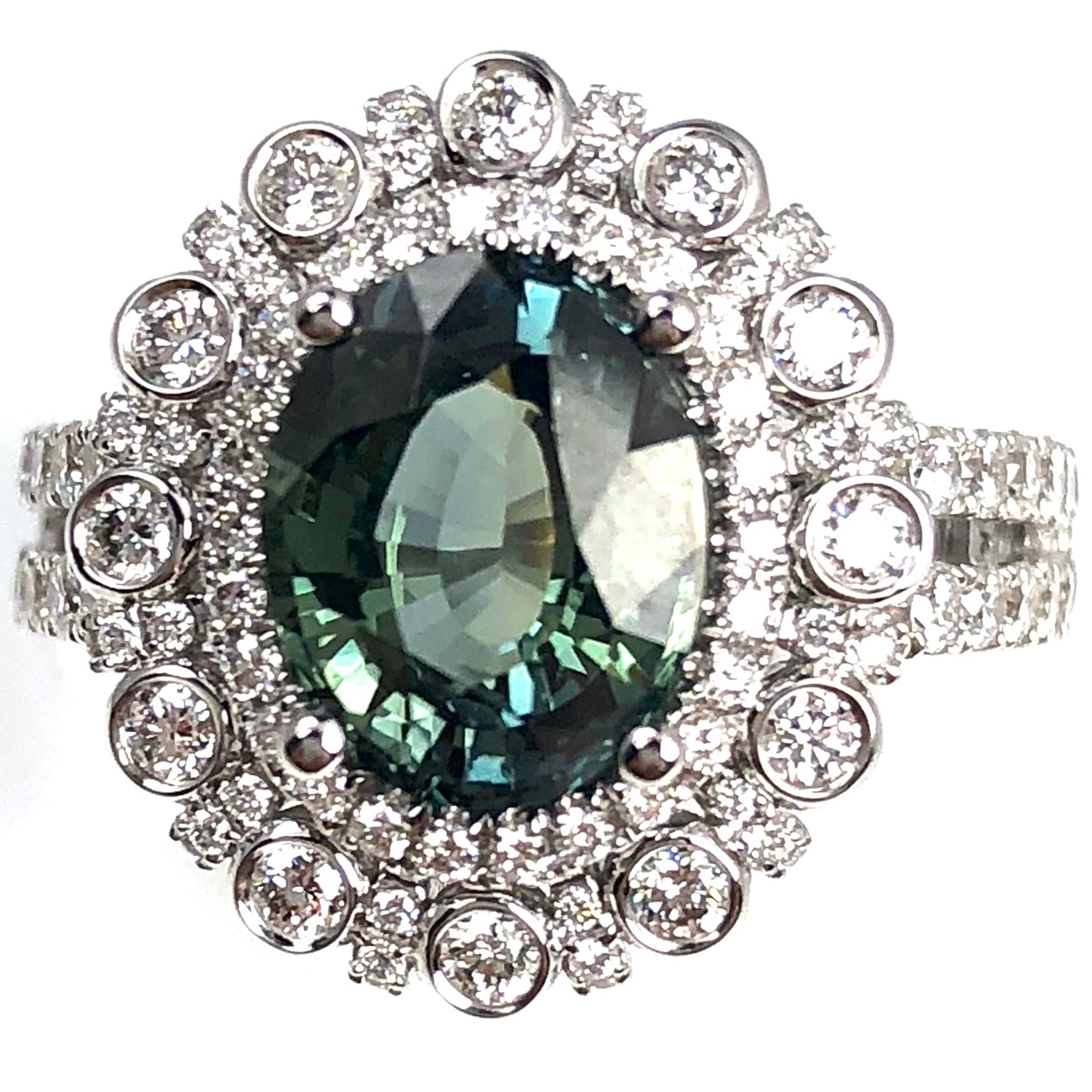 2.60 Carat Oval Cut Green Sapphire and 1.03 Carat Diamond Ring in 18 Karat Gold In New Condition In New York, NY