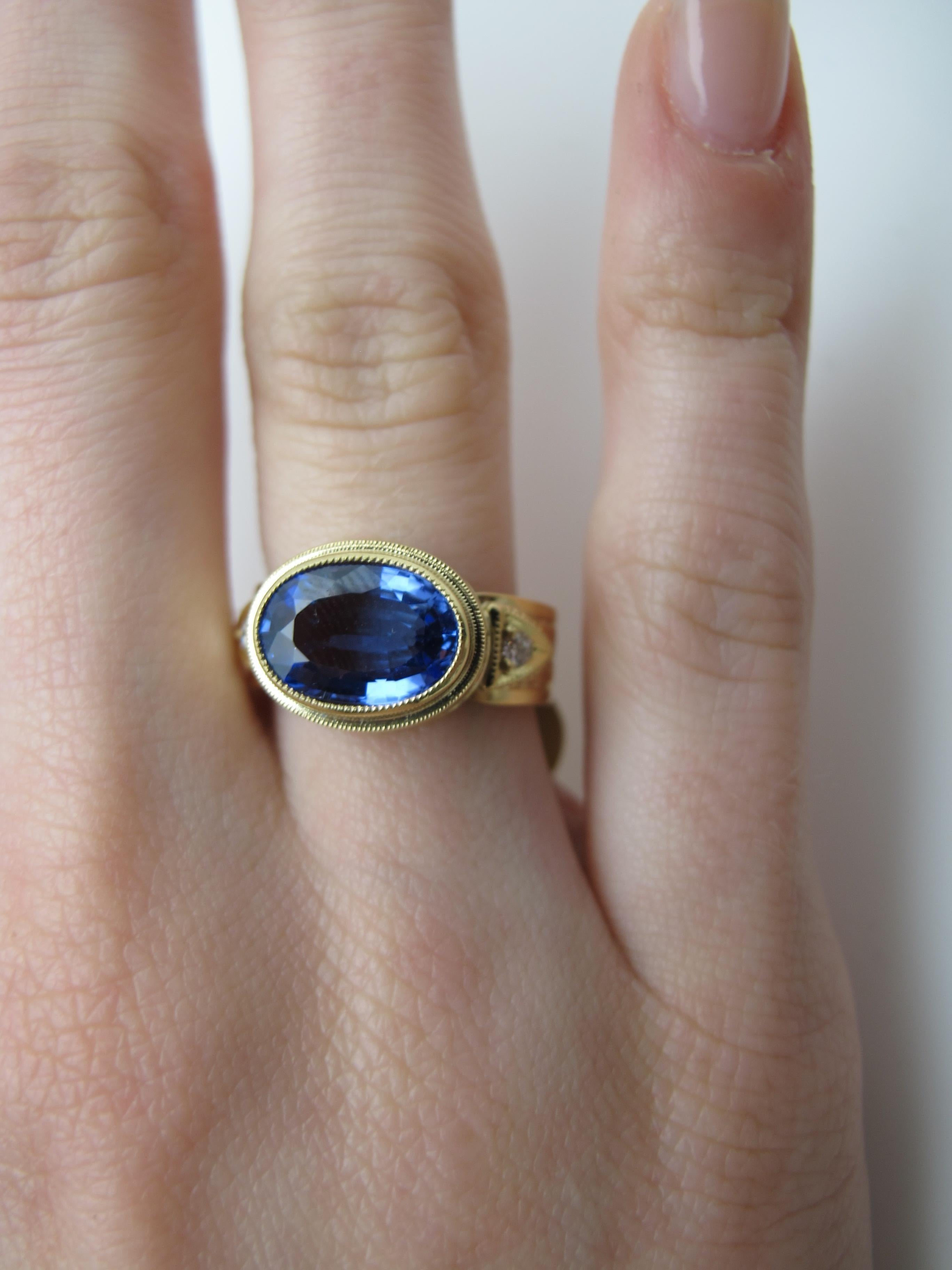 2.60 Carat Oval Tanzanite, Diamond Yellow Gold Engraved Bezel Band Ring 1