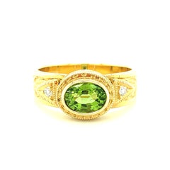 2.60 Carat Peridot and Diamond Yellow Gold Engraved Bezel Band Ring