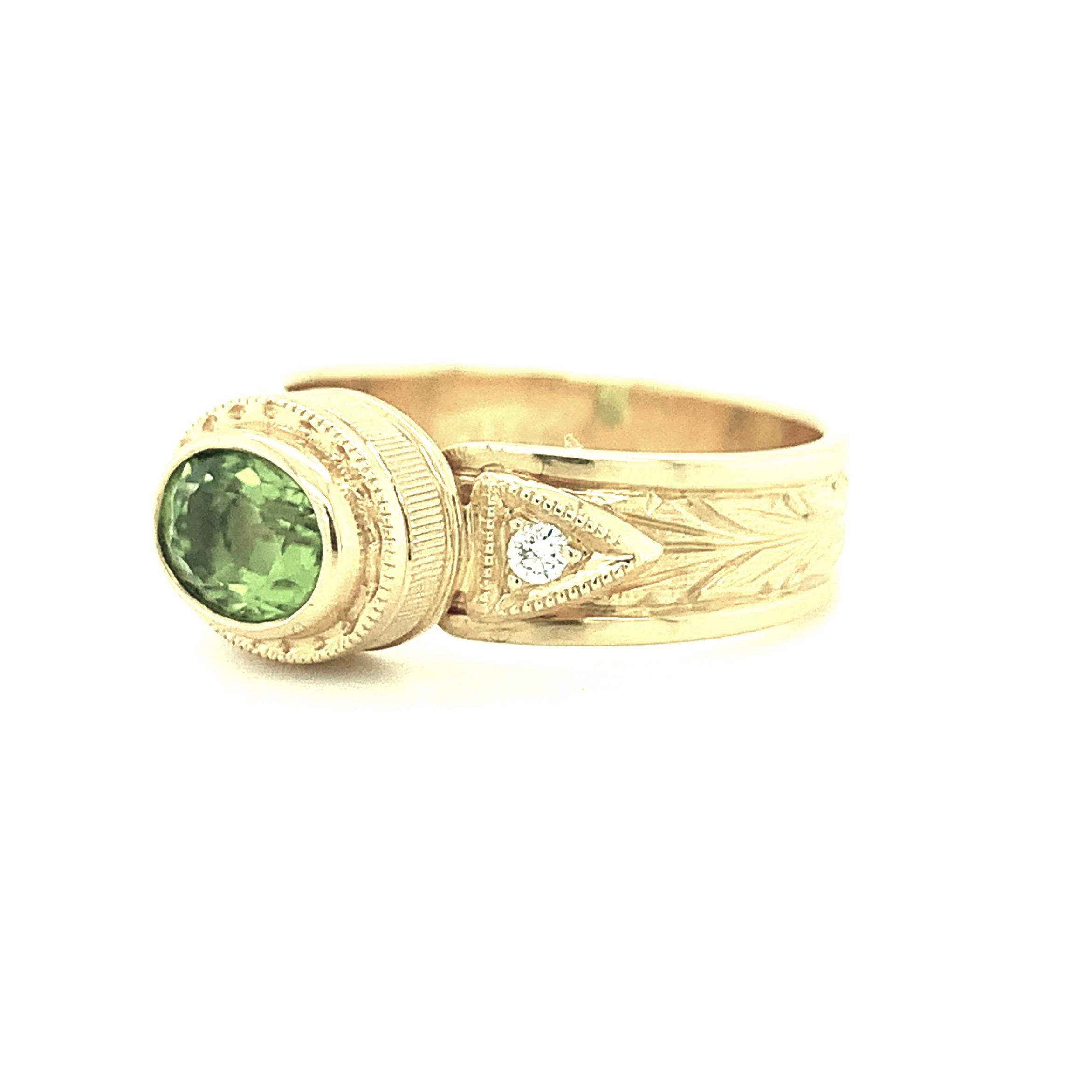 Oval Cut 2.60 Carat Peridot and Diamond Yellow Gold Engraved Bezel Band Ring For Sale