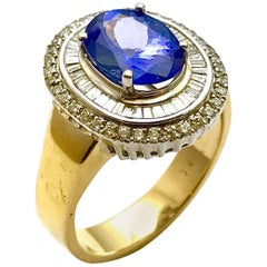 2.60 Carat Tanzanite and Diamond White and Yellow Gold Fashion Ring