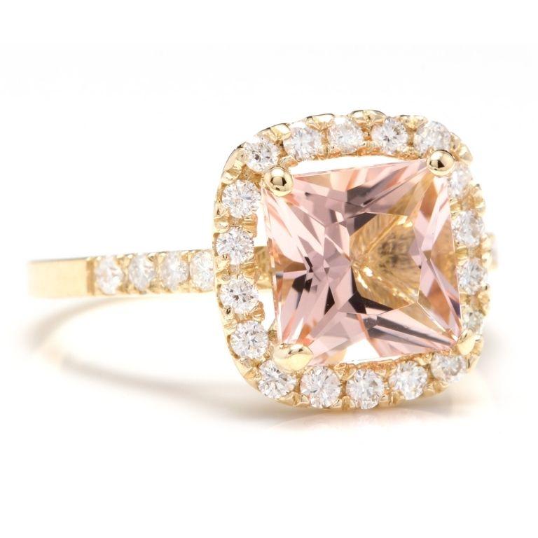 2.60 Carats Impressive Natural Morganite and Diamond 14K Yellow Gold Ring

Total Natural Pinkish Peach Square Morganite Weight is: Approx. 2.00 Carats

Morganite Measures: Approx. 6.00 x 6.00mm

Natural Round Diamonds Weight: Approx. 0.60 Carats