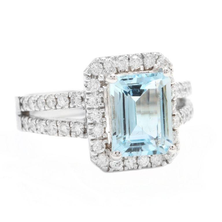2.60 Carats Natural Aquamarine and Diamond 14K Solid White Gold Ring

Total Natural Emerald Cut Aquamarine Weights: Approx. 2.00 Carats

Aquamarine Measures: Approx. 9.00 x 7.00mm

Aquamarine Treatment: Heat

Natural Round Diamonds Weight: Approx.