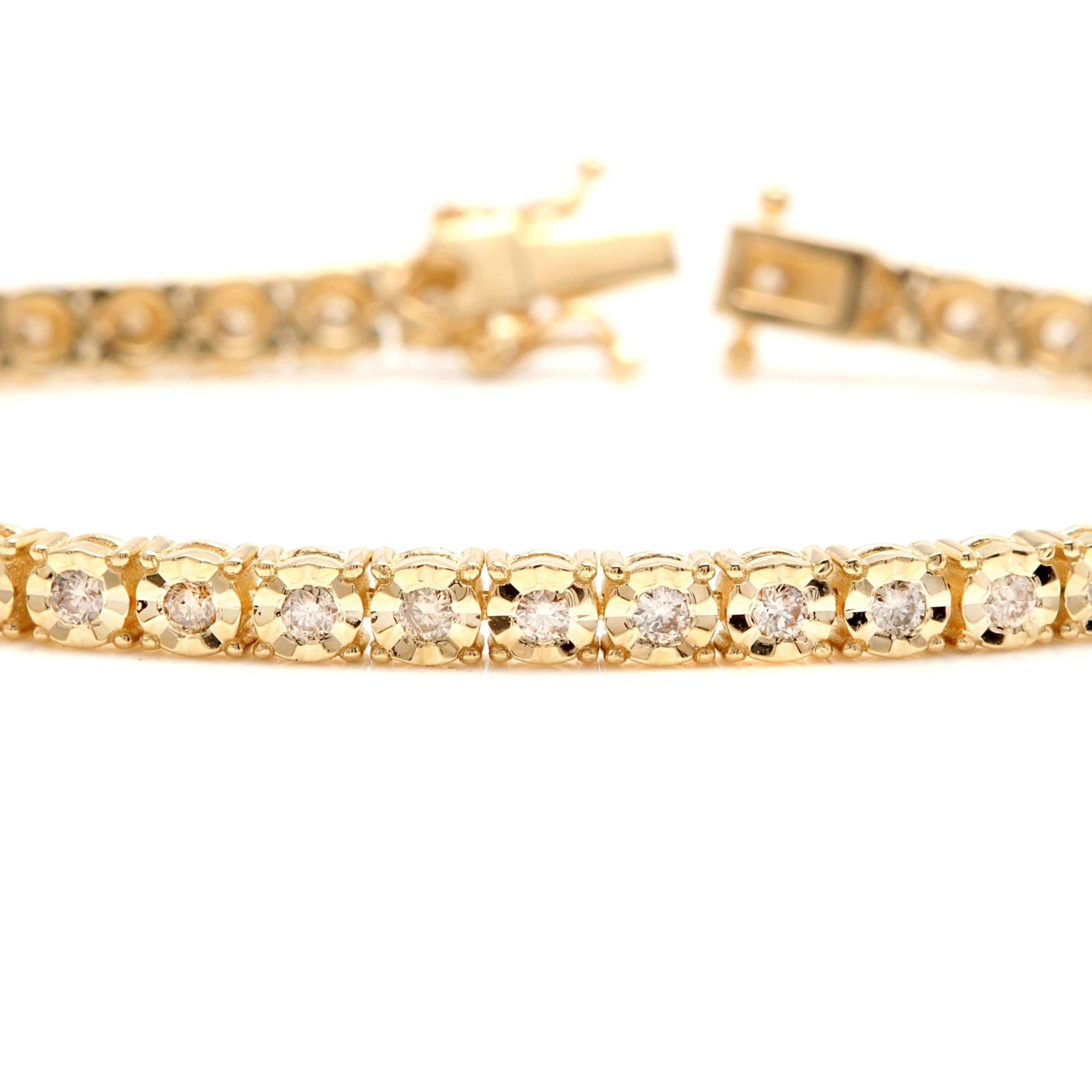 Very Impressive 2.60 Carats Natural Diamond 14K Solid Yellow Gold Tennis Bracelet

STAMPED: 14K

Total Natural Round Diamonds Weight: Approx. 2.60 Carats (37pcs.) (color J-K / Clarity SI1-SI2)

Bracelet Length is:  7 inches

Width: 4.6mm

Bracelet