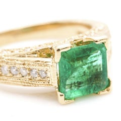 2.60 Carat Natural Emerald and Diamond 14 Karat Solid Yellow Gold Ring