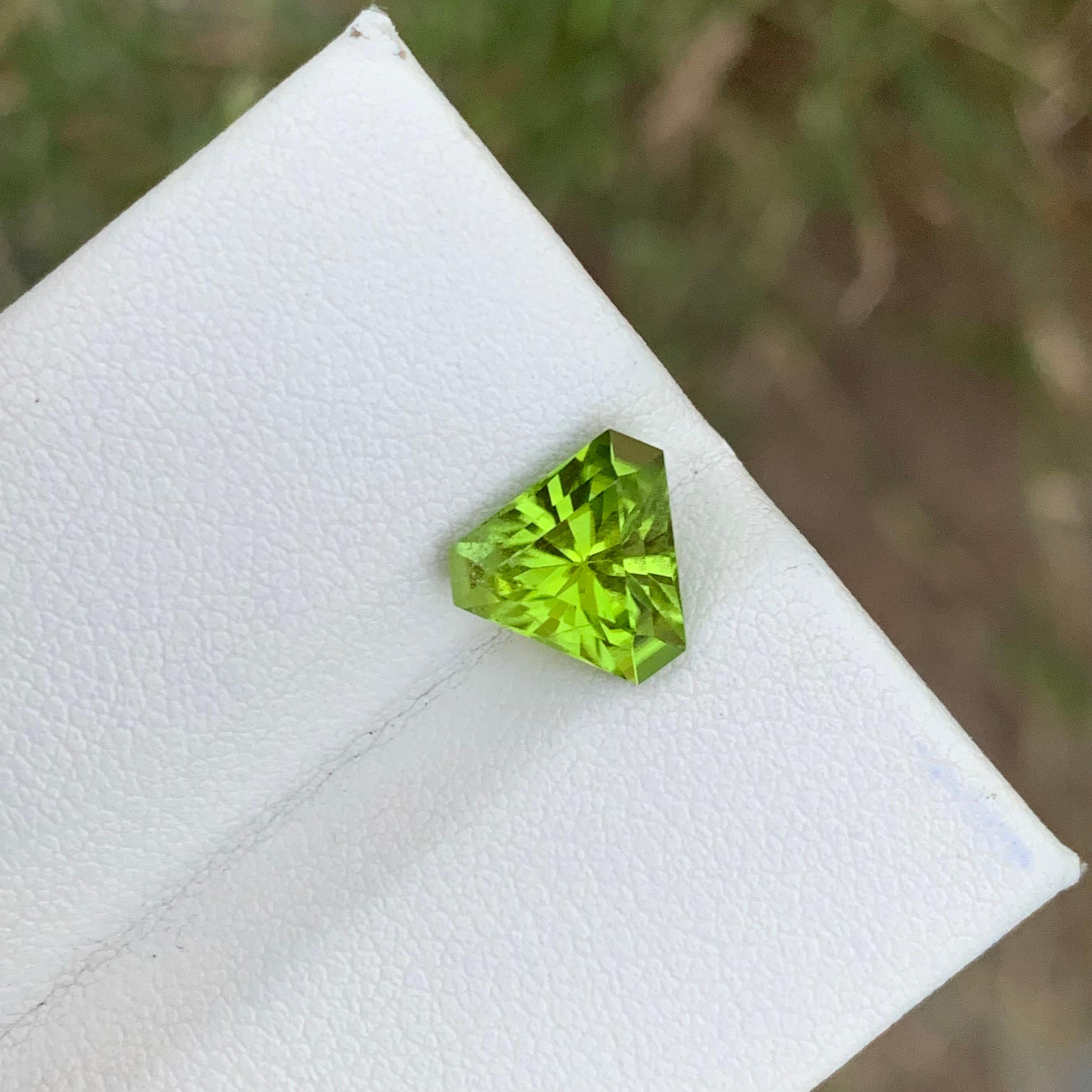 Faceted Peridot 
Weight: 2.60 Carats 
Dimension: 8.3x9.6x5.6 mm
Origin; Pakistan 
Shape: Trilliant
Color: Green
Treatment: Non
Peridot, a vibrant and dazzling gemstone, is a remarkable member of the olivine mineral family. Renowned for its stunning