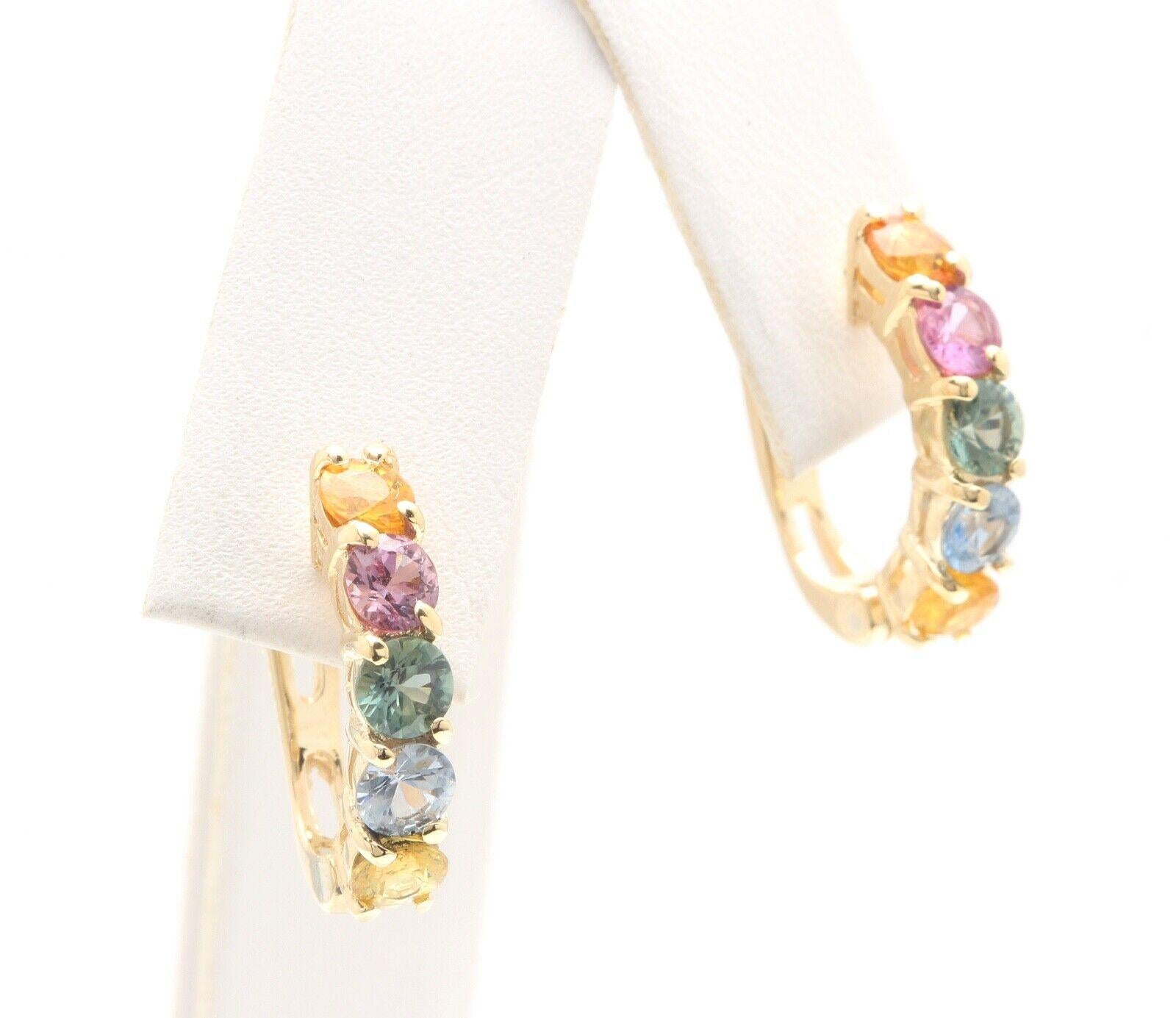 2.60 Carats Natural Multi-Color Sapphire 14K Solid Yellow Gold Earrings

Amazing looking piece! 

Total Natural Round Cut Sapphires Weight is Approx. 2.60 Carats (both earrings)

Earring Measures: 17.85 x 14.30mm

Total Earrings Weight is: 4.5